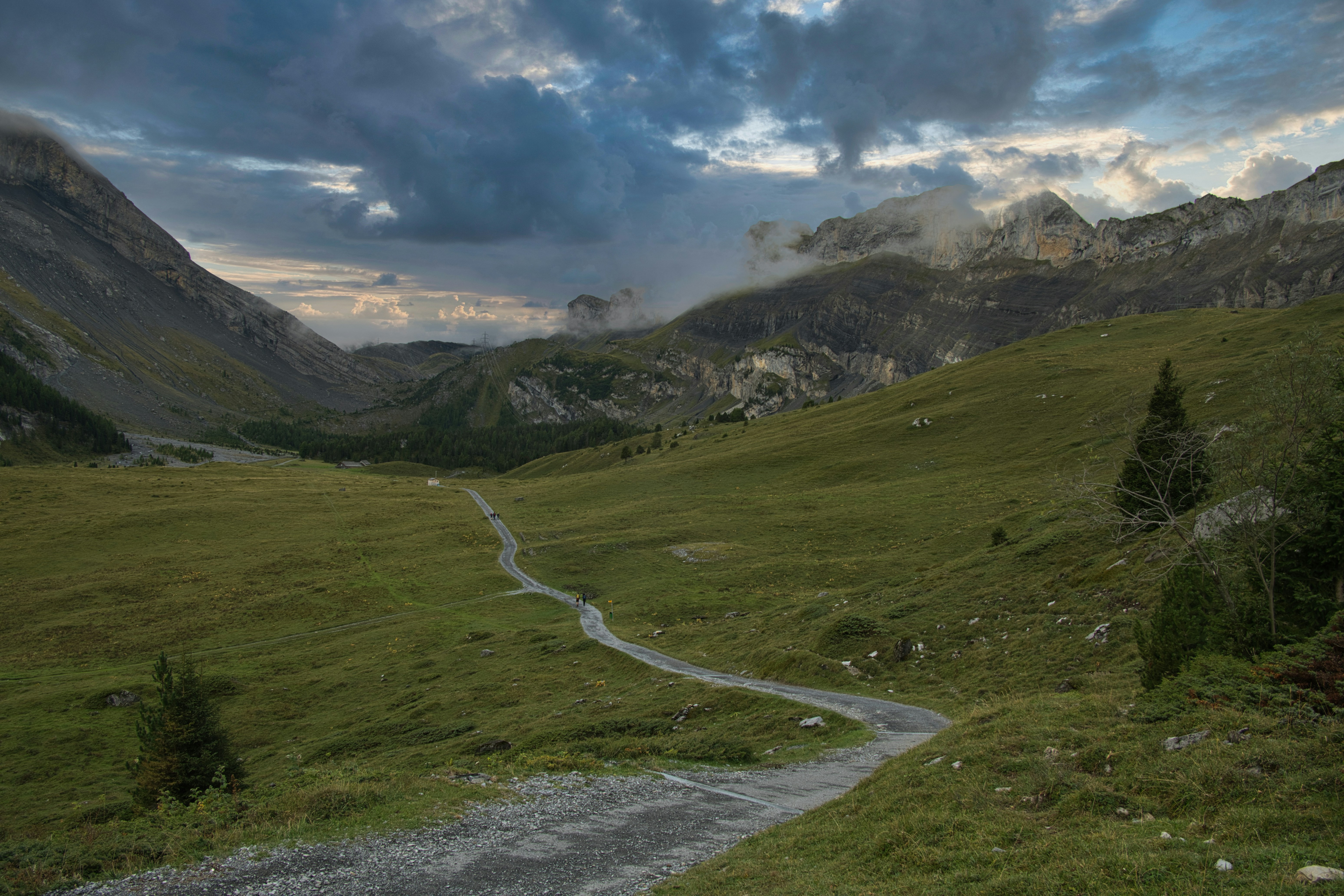 Winding path through green mountain valley - Free Photo on Unsplash