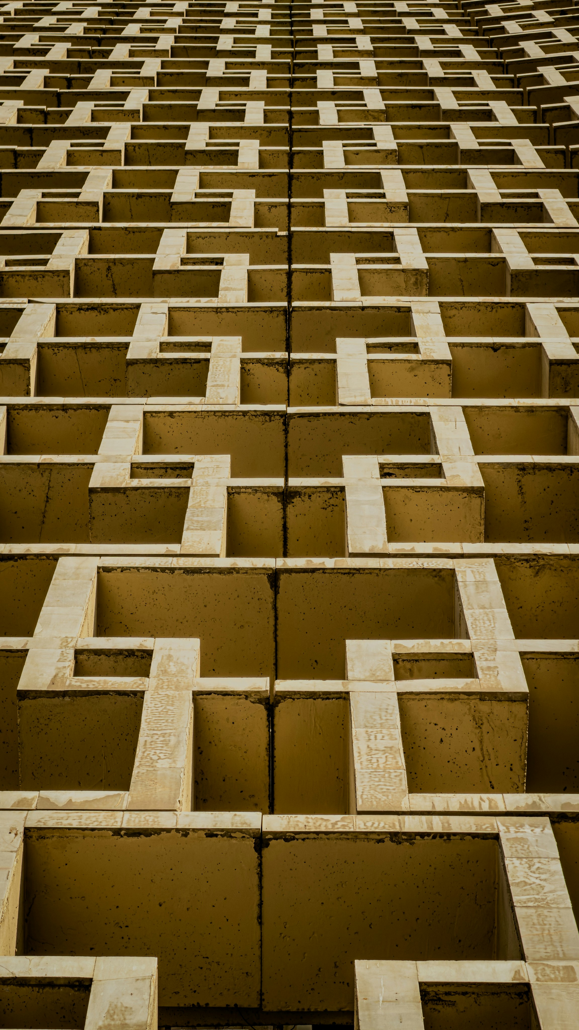 Geometric concrete pattern on building facade - Free Photo on Unsplash