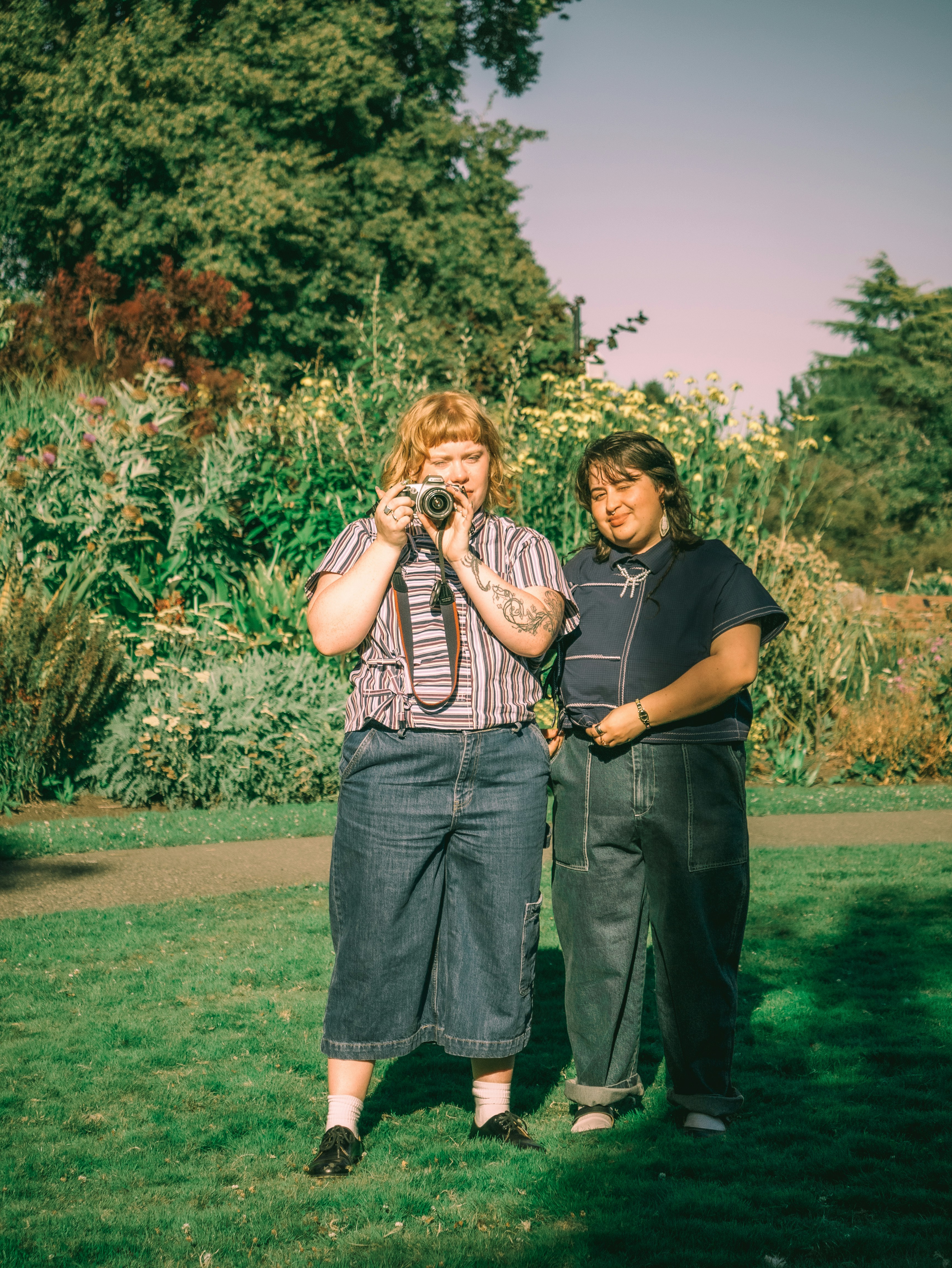 Two adults in sunlit park - Free Photo on Unsplash