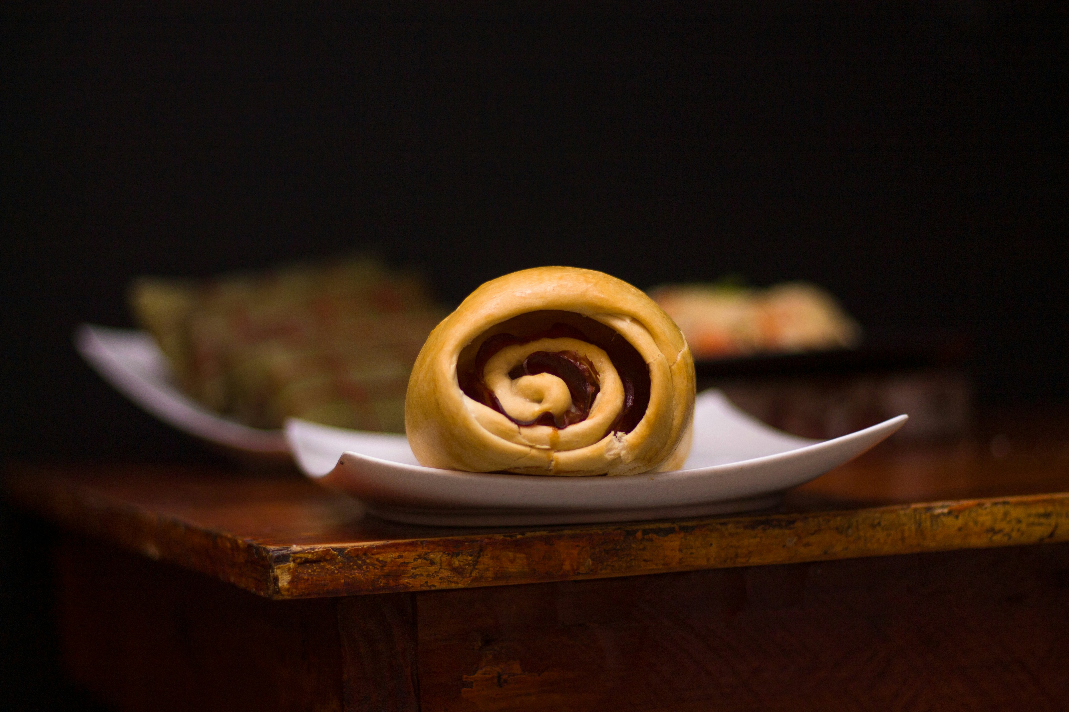 Rolled pastry on white plate - Free Photo on Unsplash