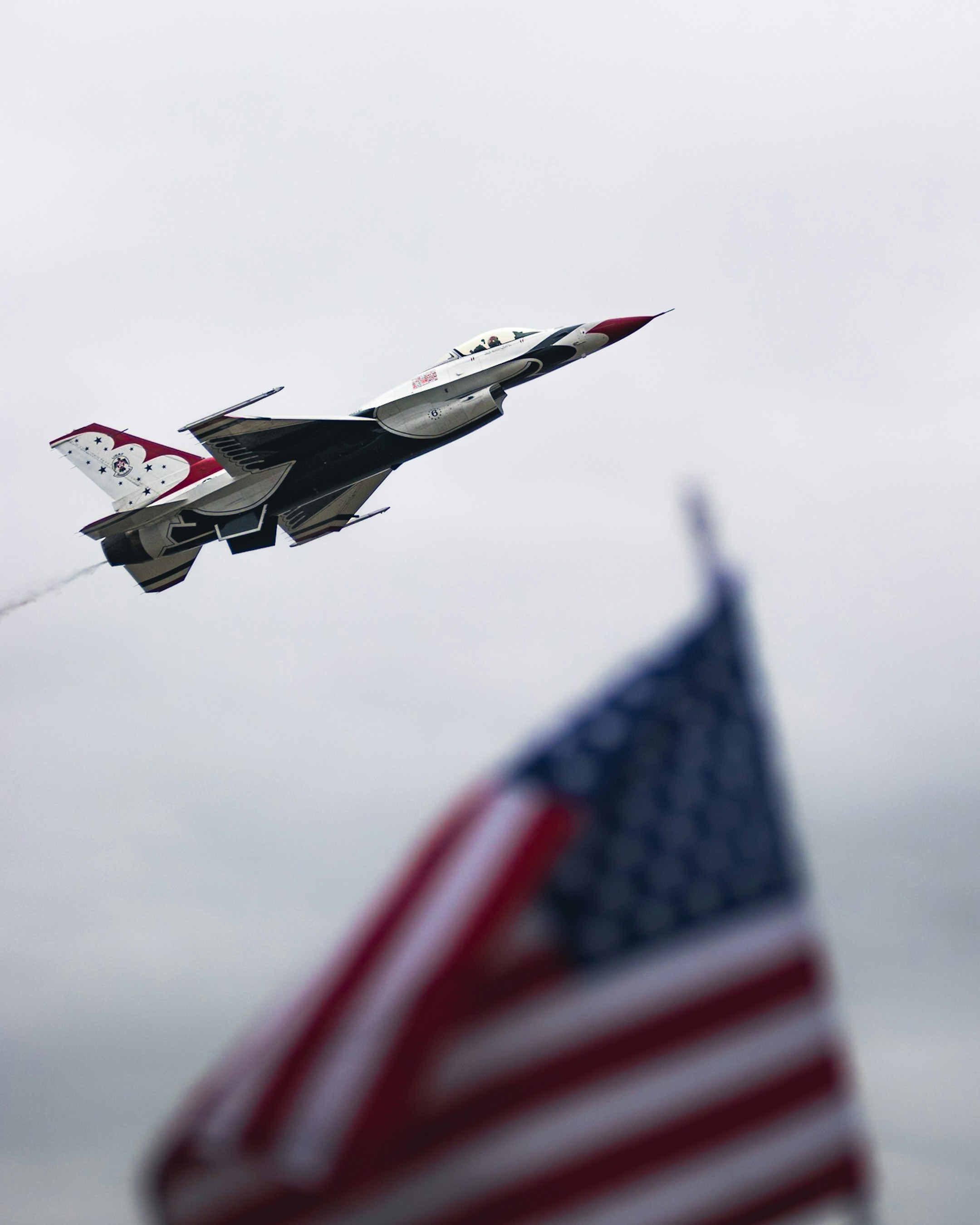 Thunderbird fighter jet and American flag - Free Photo on Unsplash