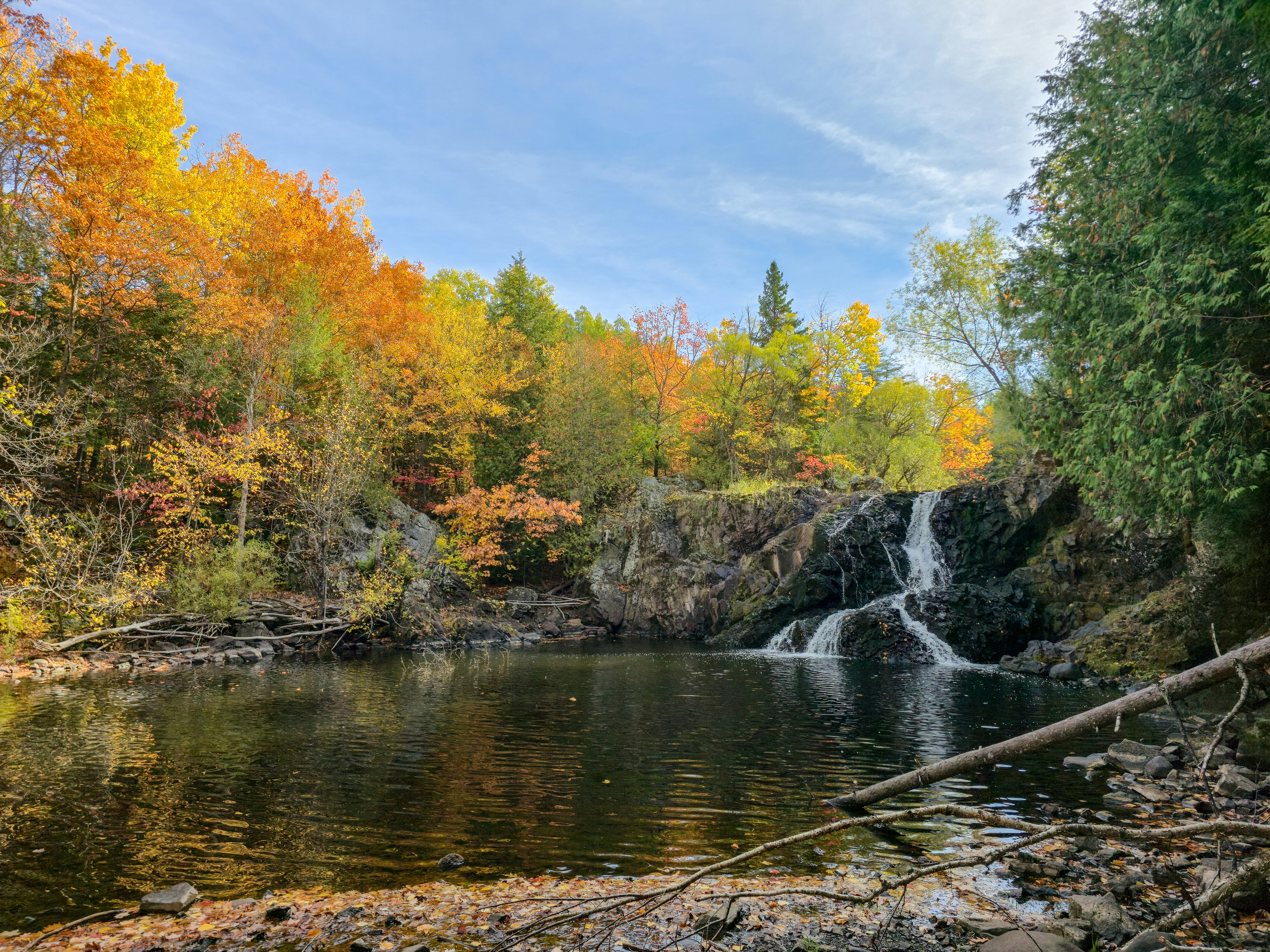 Waterfall in vibrant autumn forest - Free Photo on Unsplash
