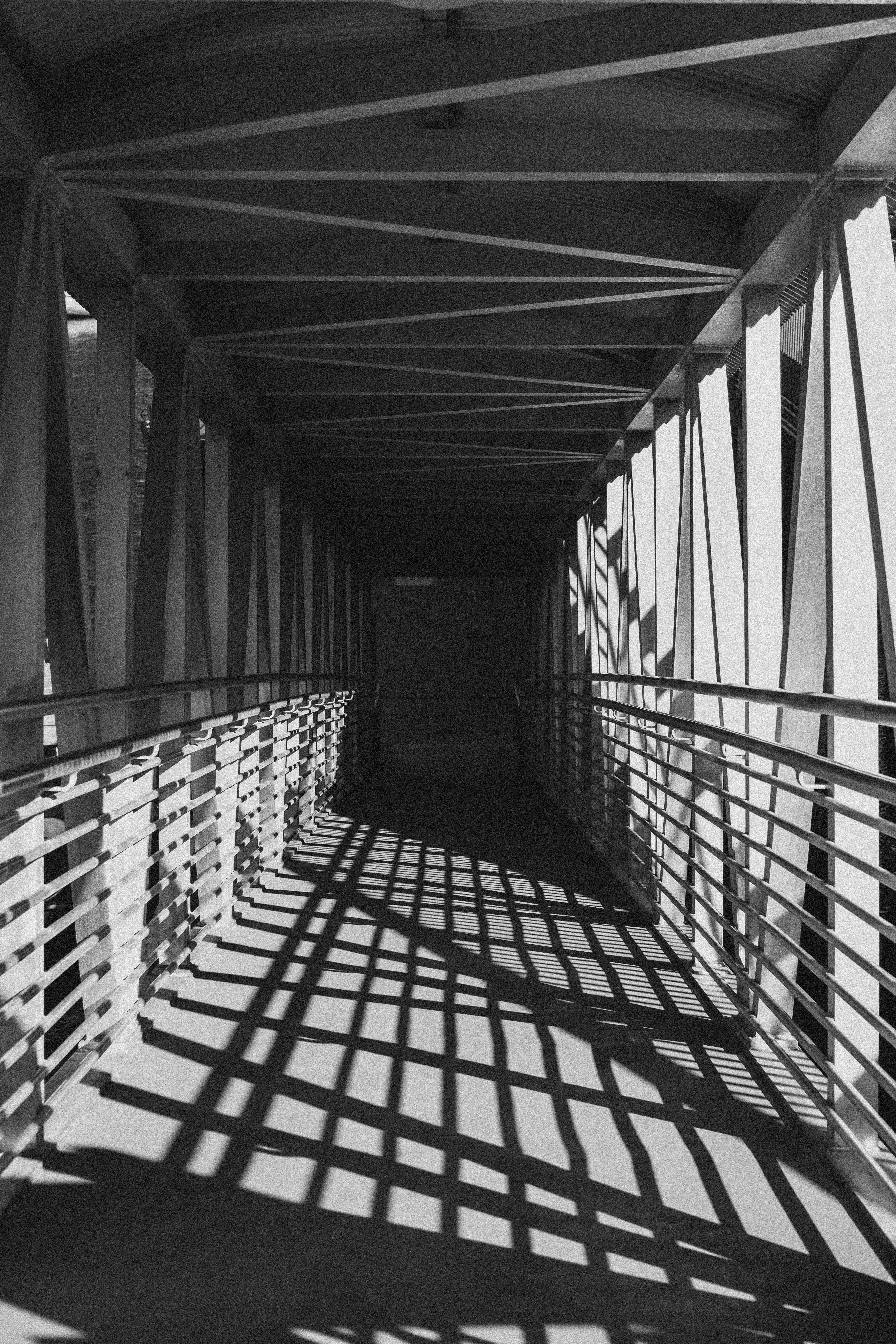 Pedestrian bridge with long shadows - Free Photo on Unsplash