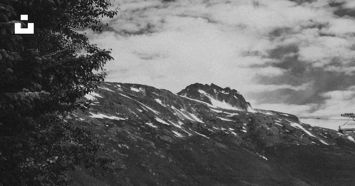 Train Track. Download Train on curved tracks near mountain - Free Photo on Unsplash