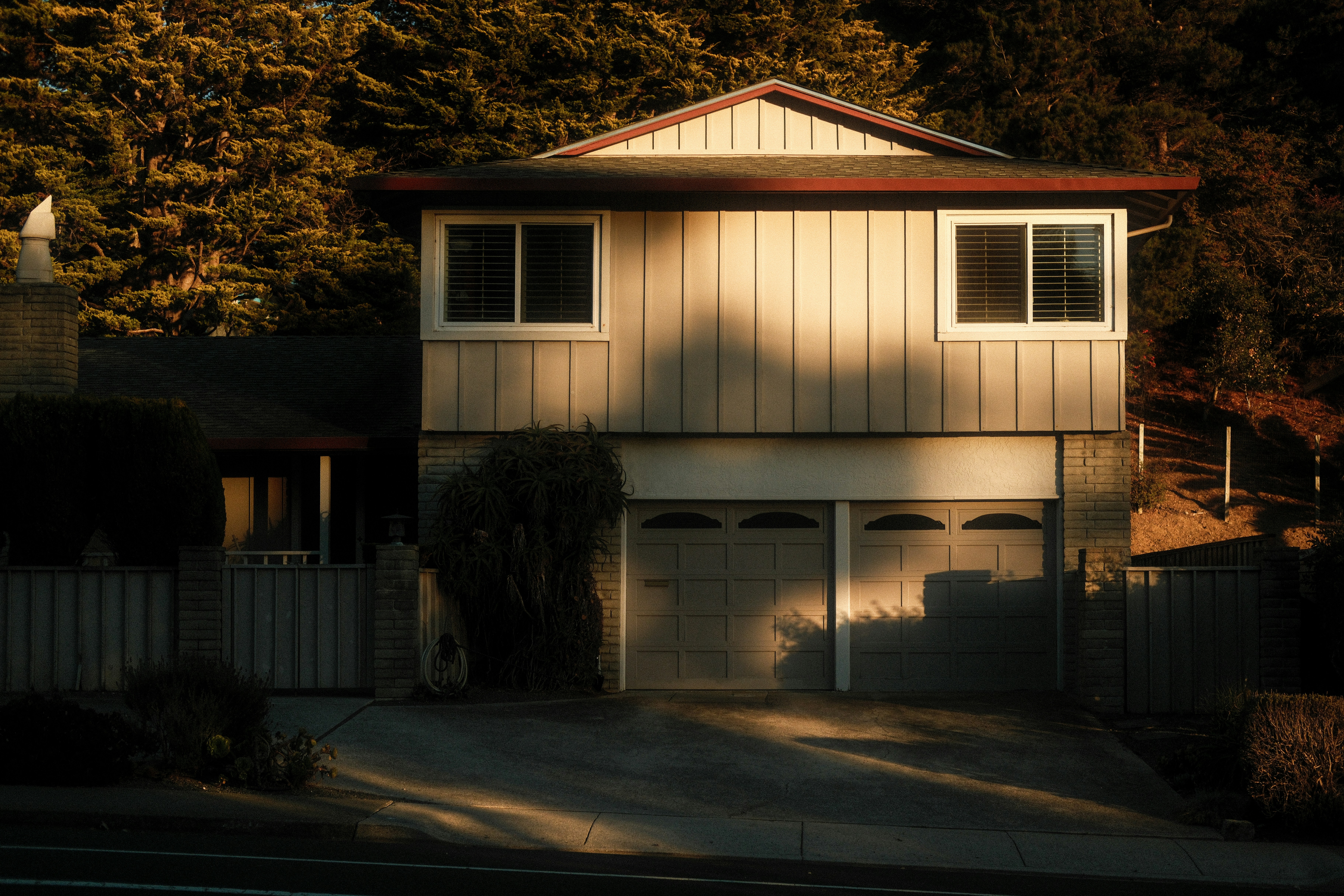 A two story suburban house with a garage, a typical Michigan starter home