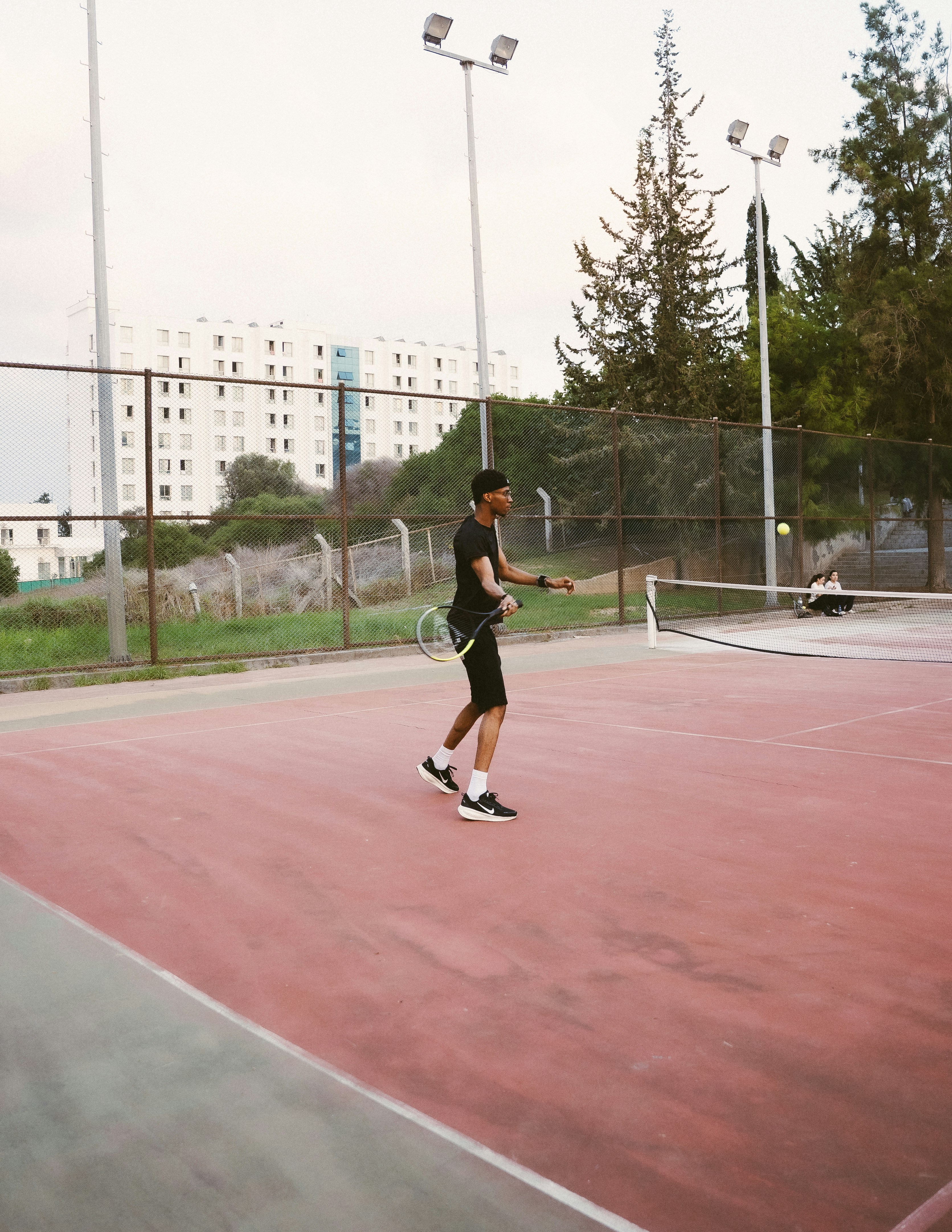 Man playing tennis on red court - Free Photo on Unsplash