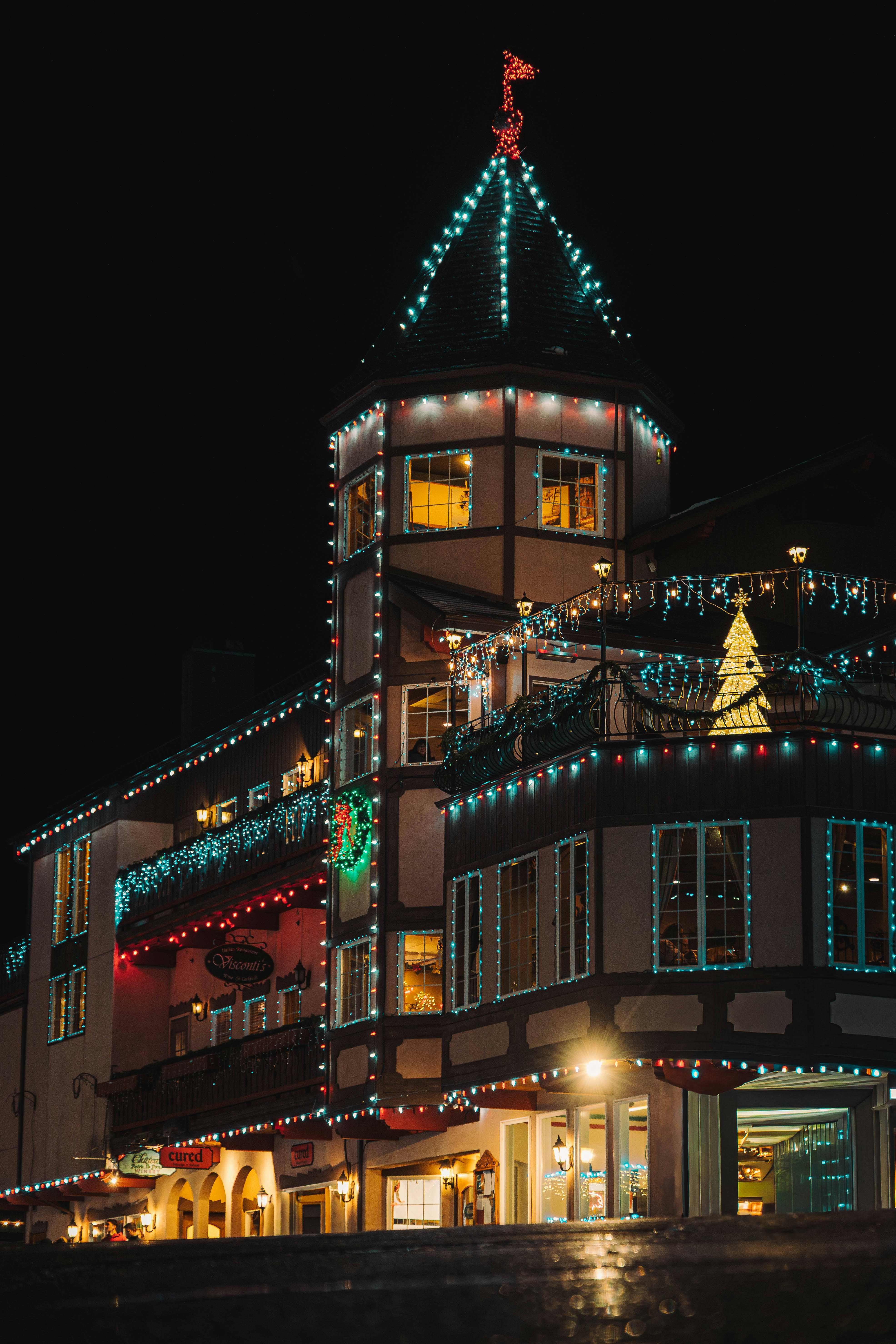 Timber building with festive holiday lights - Free Photo on Unsplash