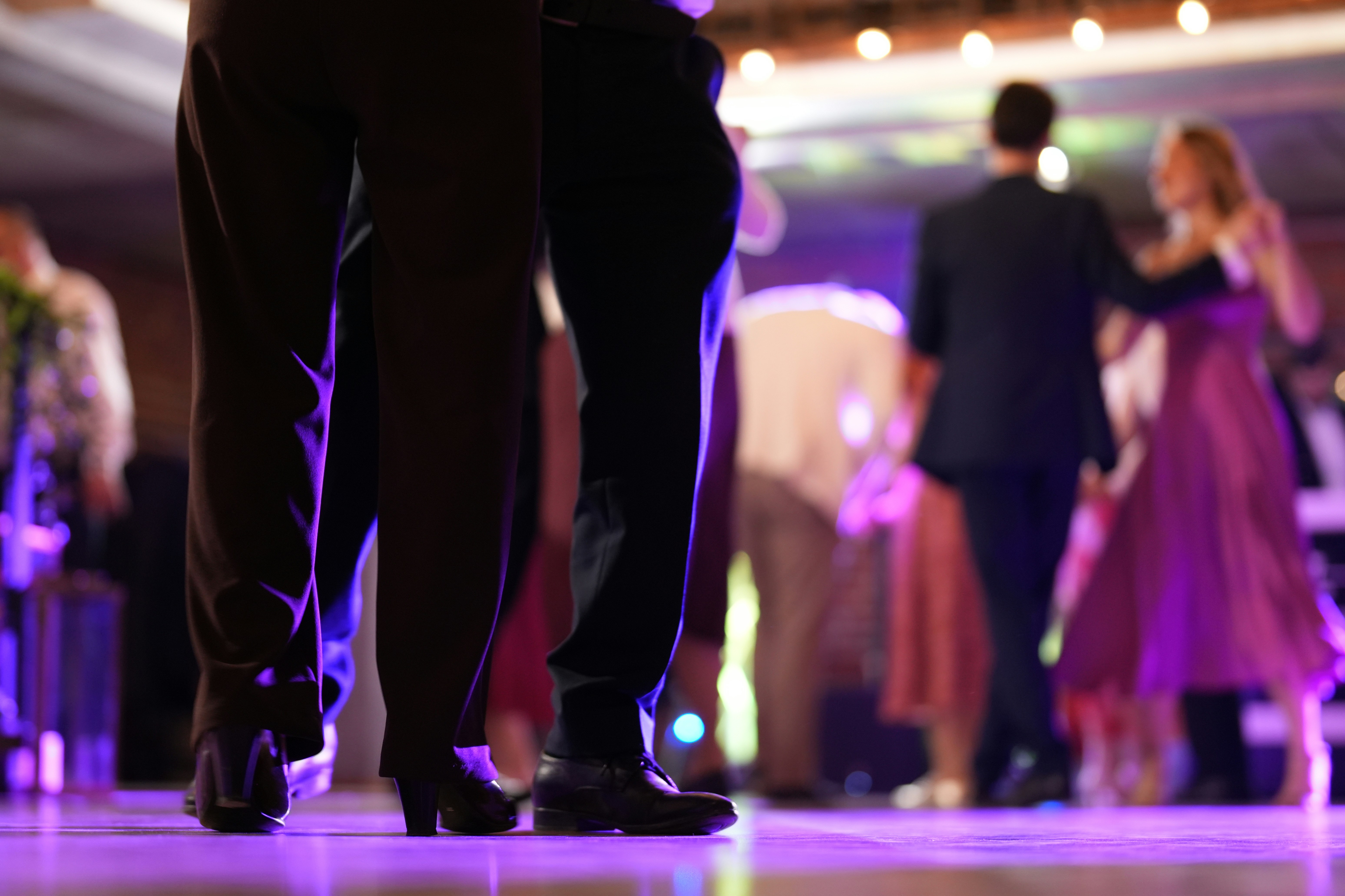 People dancing in purple light - Free Photo on Unsplash