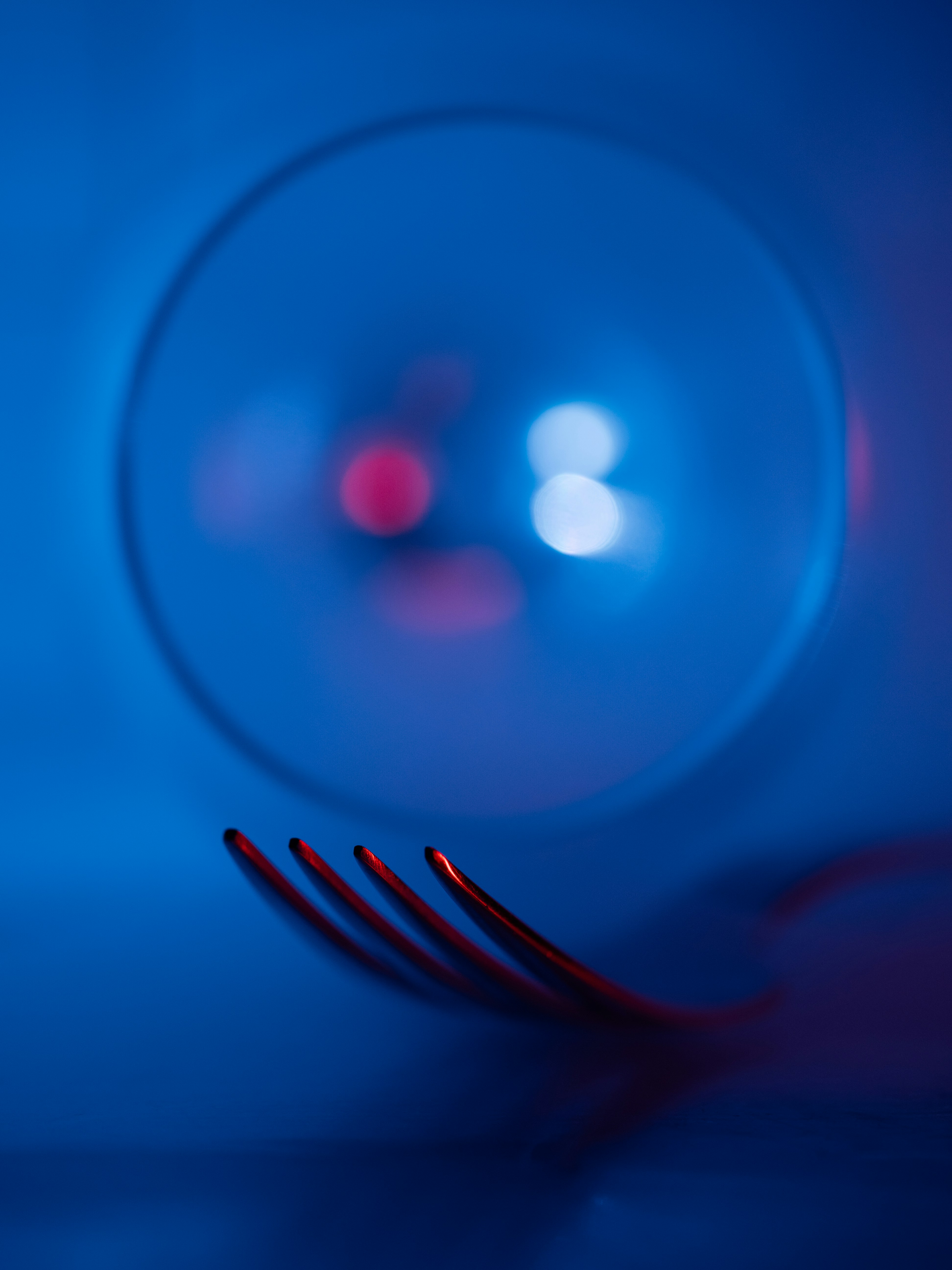 Fork in silhouette with blue bokeh - Free Photo on Unsplash