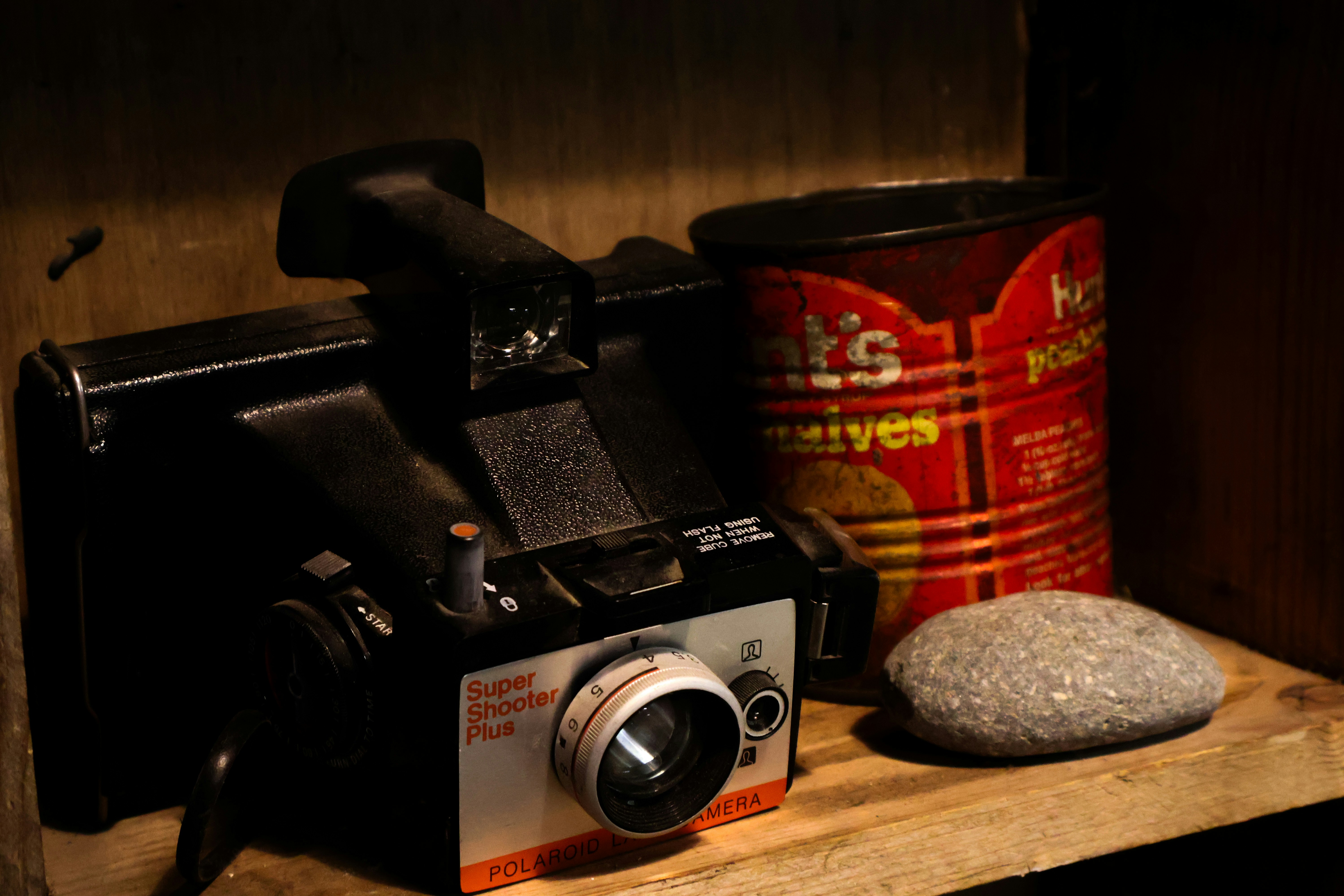 Vintage polaroid camera with tin can - Free Photo on Unsplash