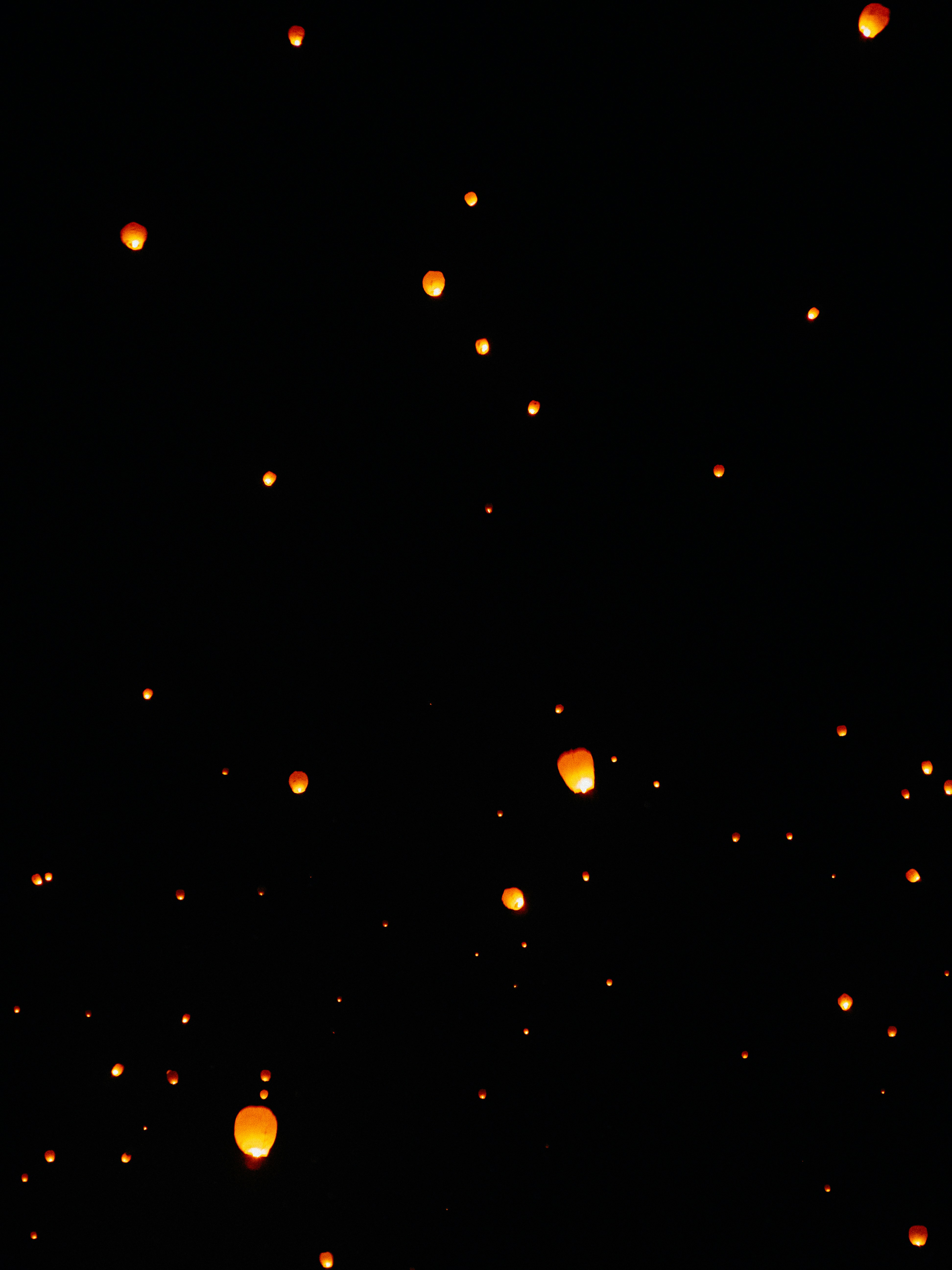 Glowing paper lanterns in night sky - Free Photo on Unsplash