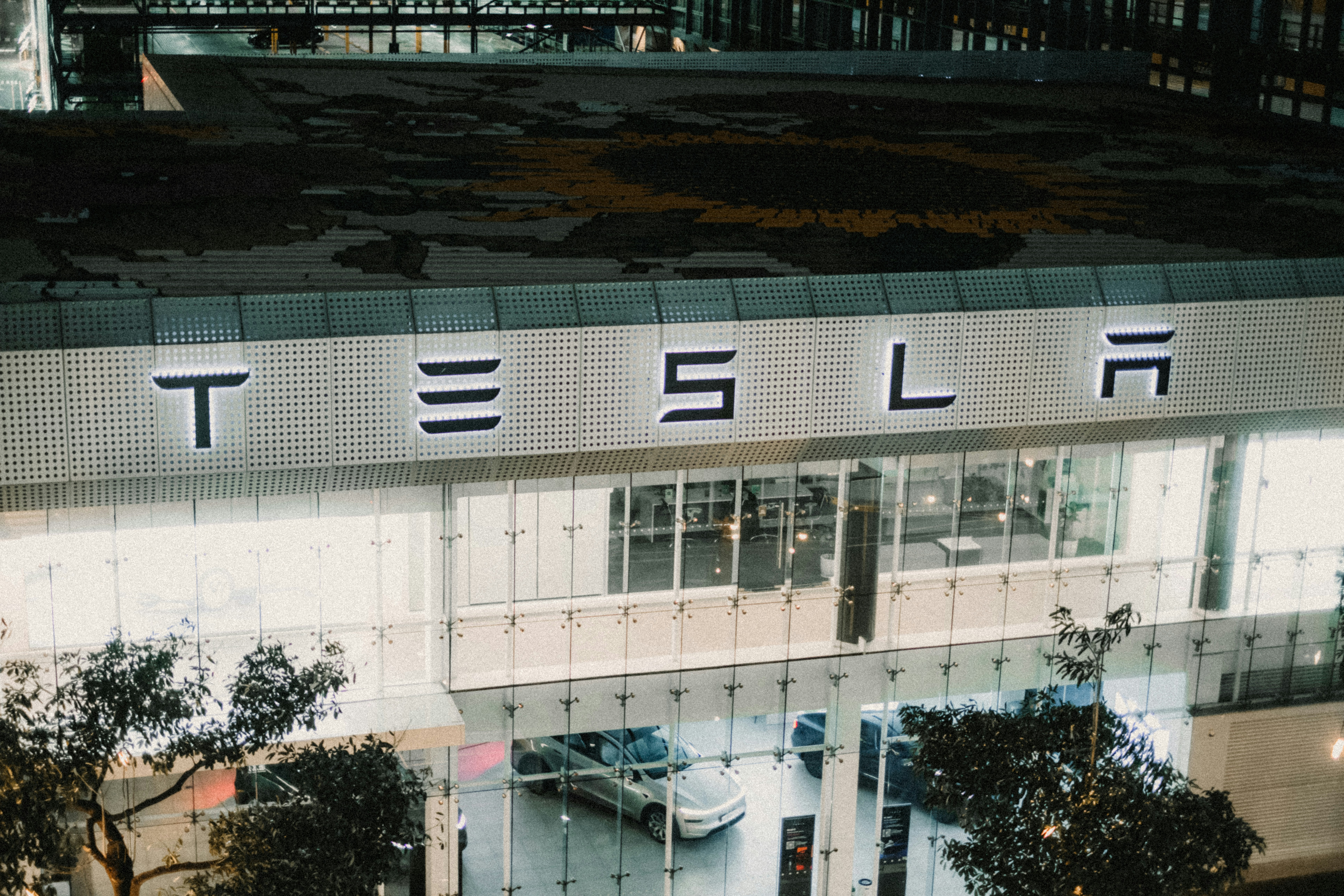 Tesla showroom facade with illuminated sign - Free Photo on Unsplash