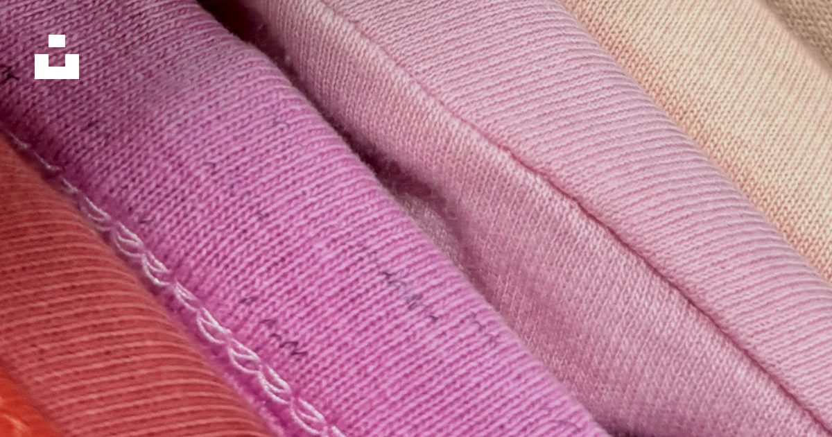 Alpha Textile Jacket Folded t-shirts in pink gradient - Free Photo on Unsplash