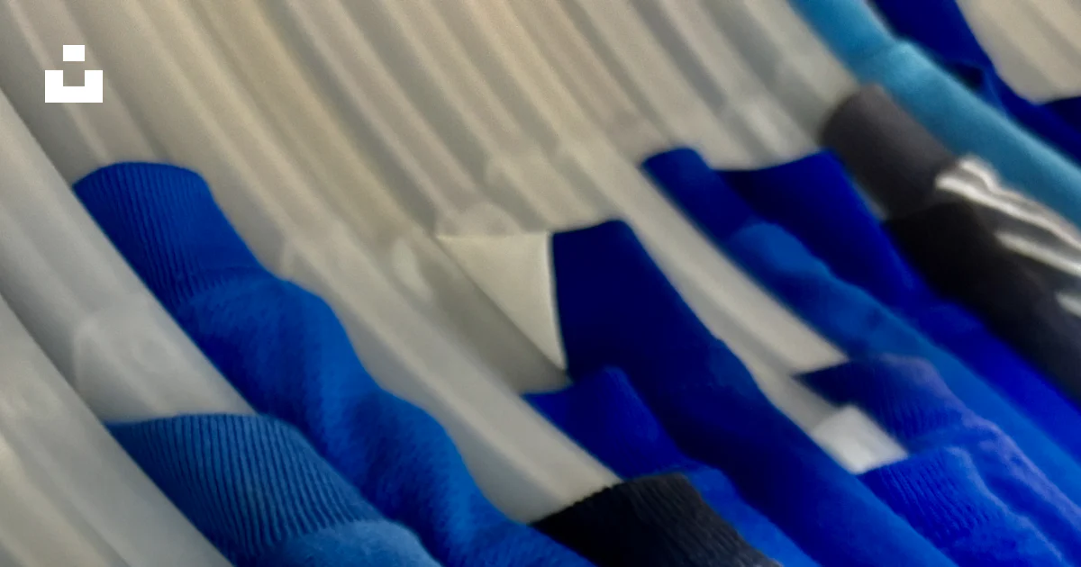 Alpha Textile Jacket Blue shirts hanging on hangers - Free Photo on Unsplash