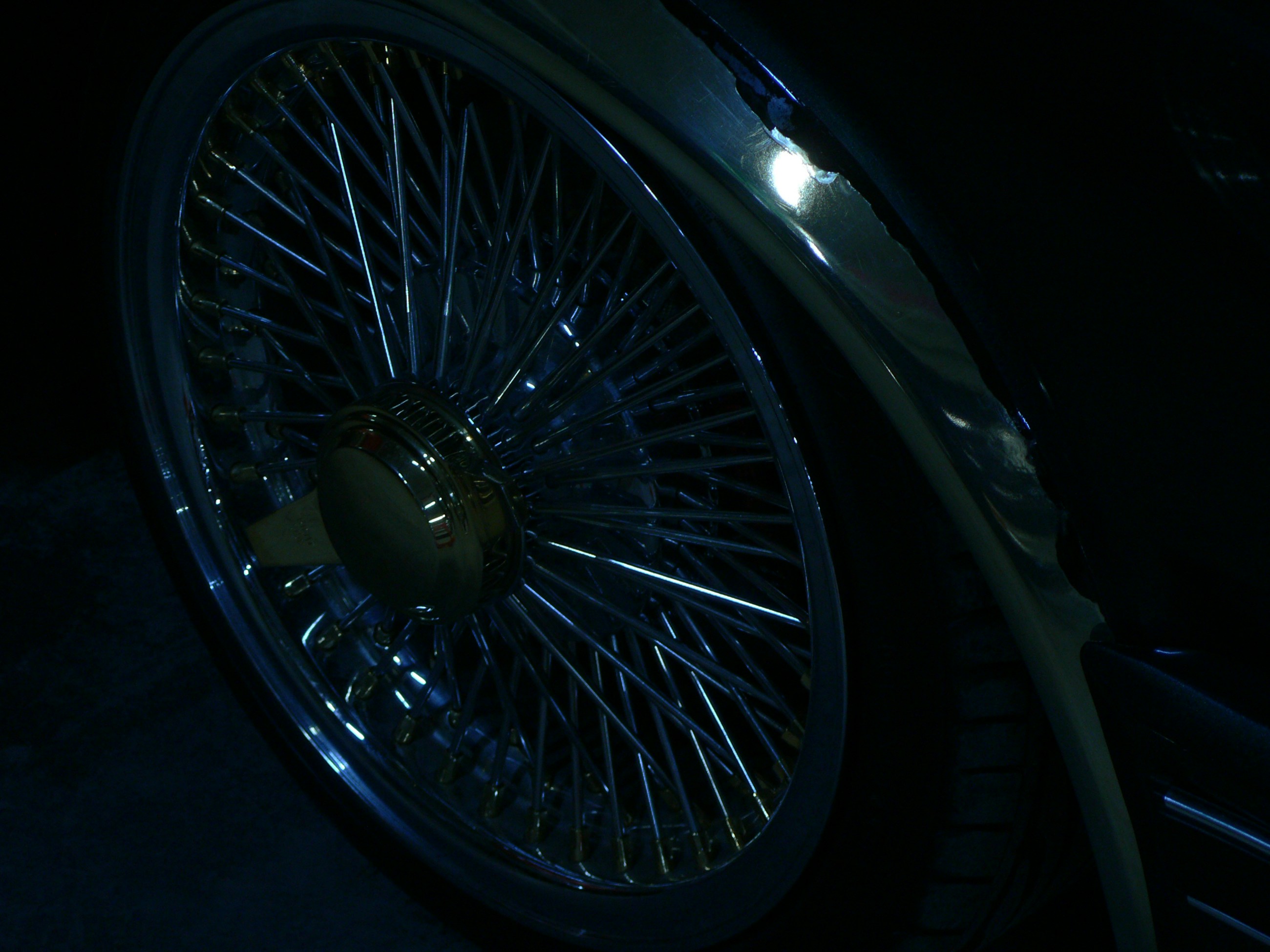 Chrome wire wheel on dark car - Free Photo on Unsplash