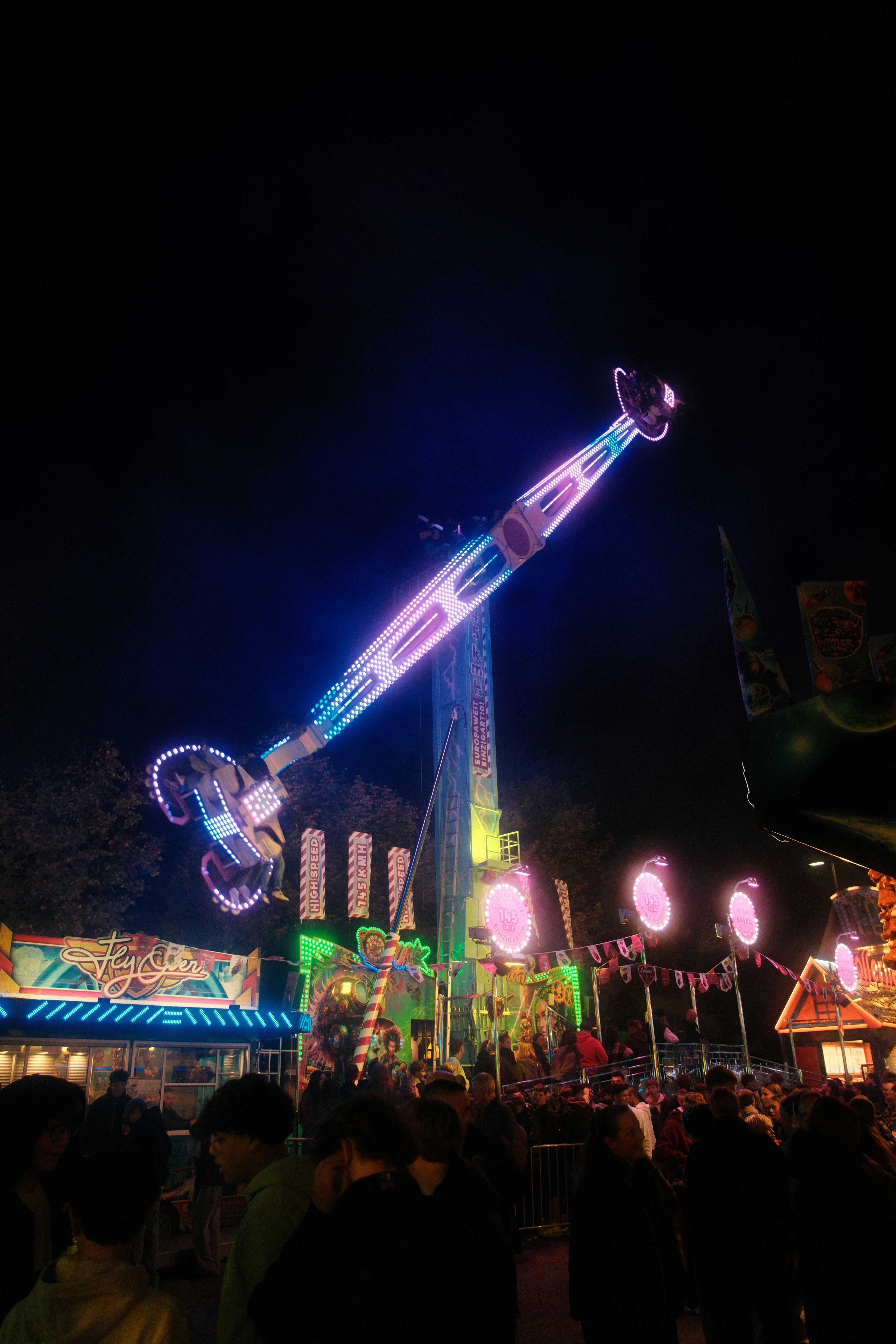 Spinning amusement ride with glowing lights - Free Photo on Unsplash