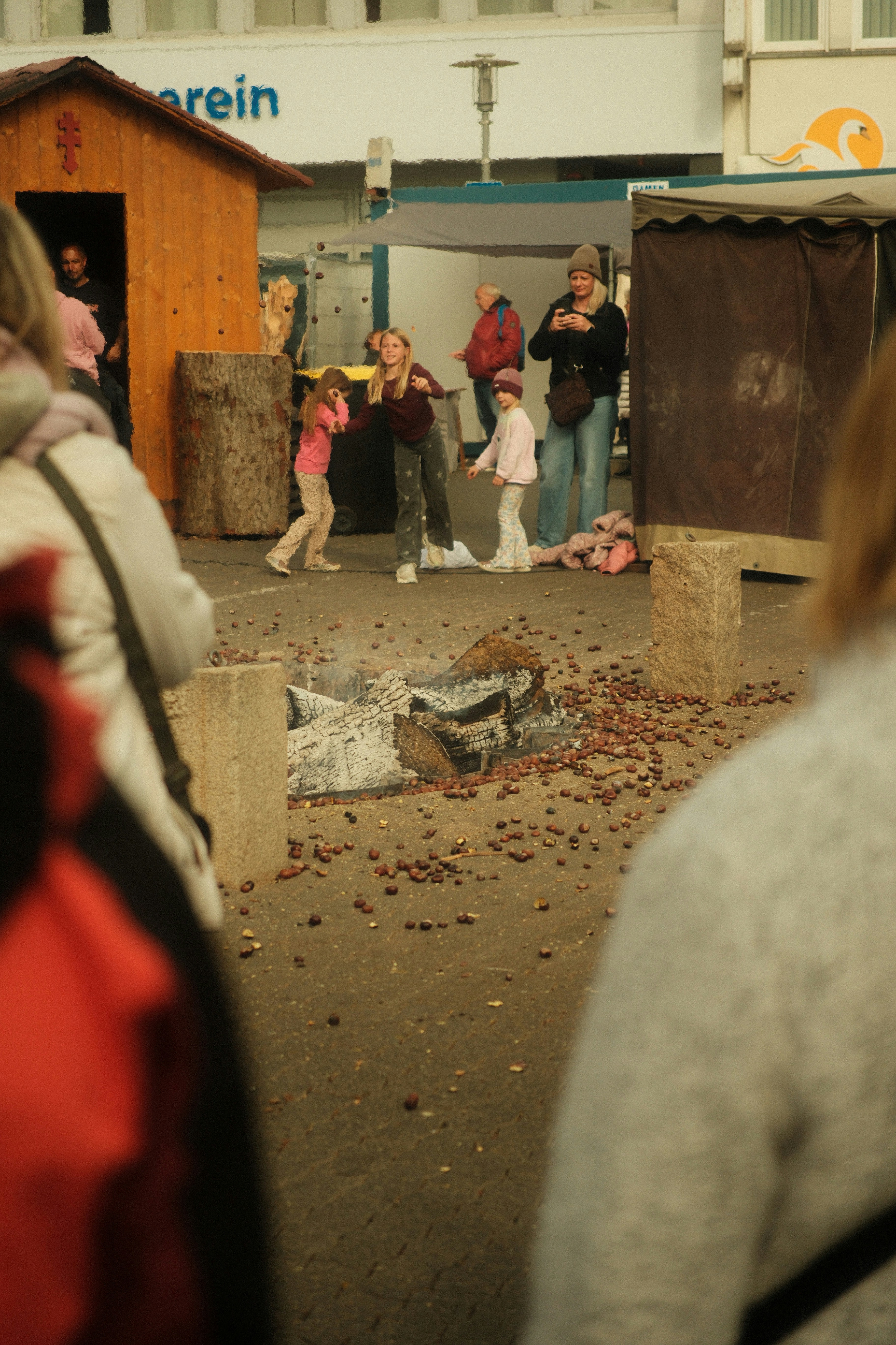 Children playing near outdoor market fire - Free Photo on Unsplash