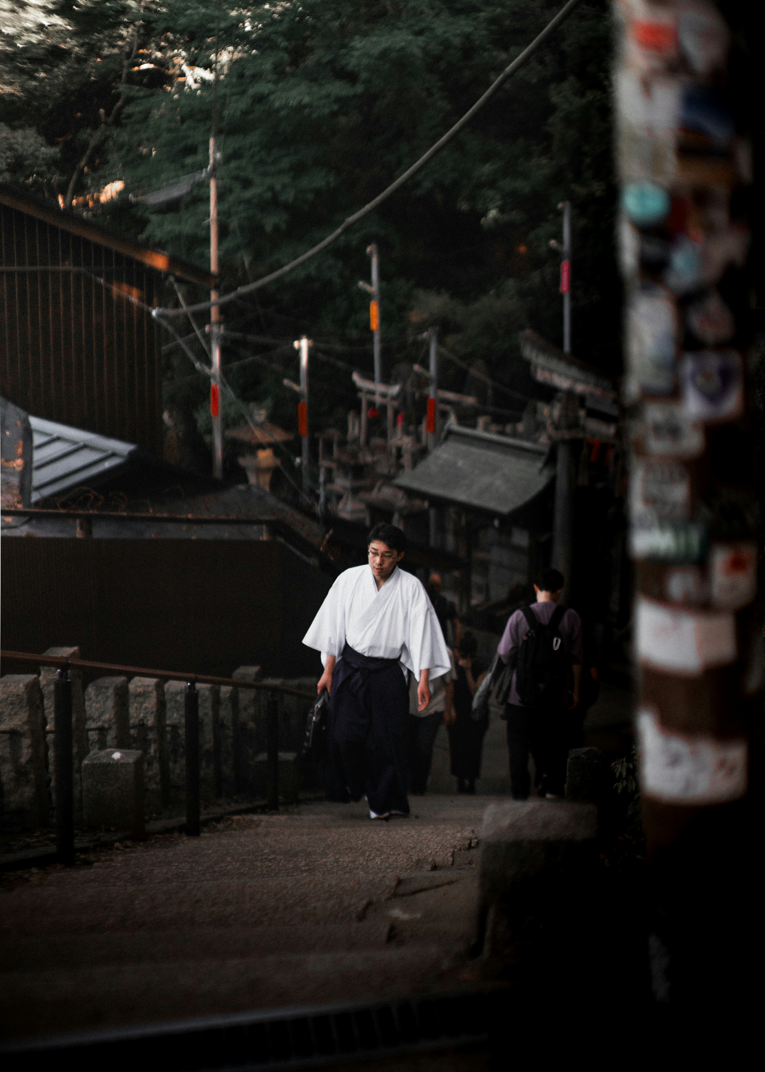 Man in kimono walking down steps - Free Photo on Unsplash