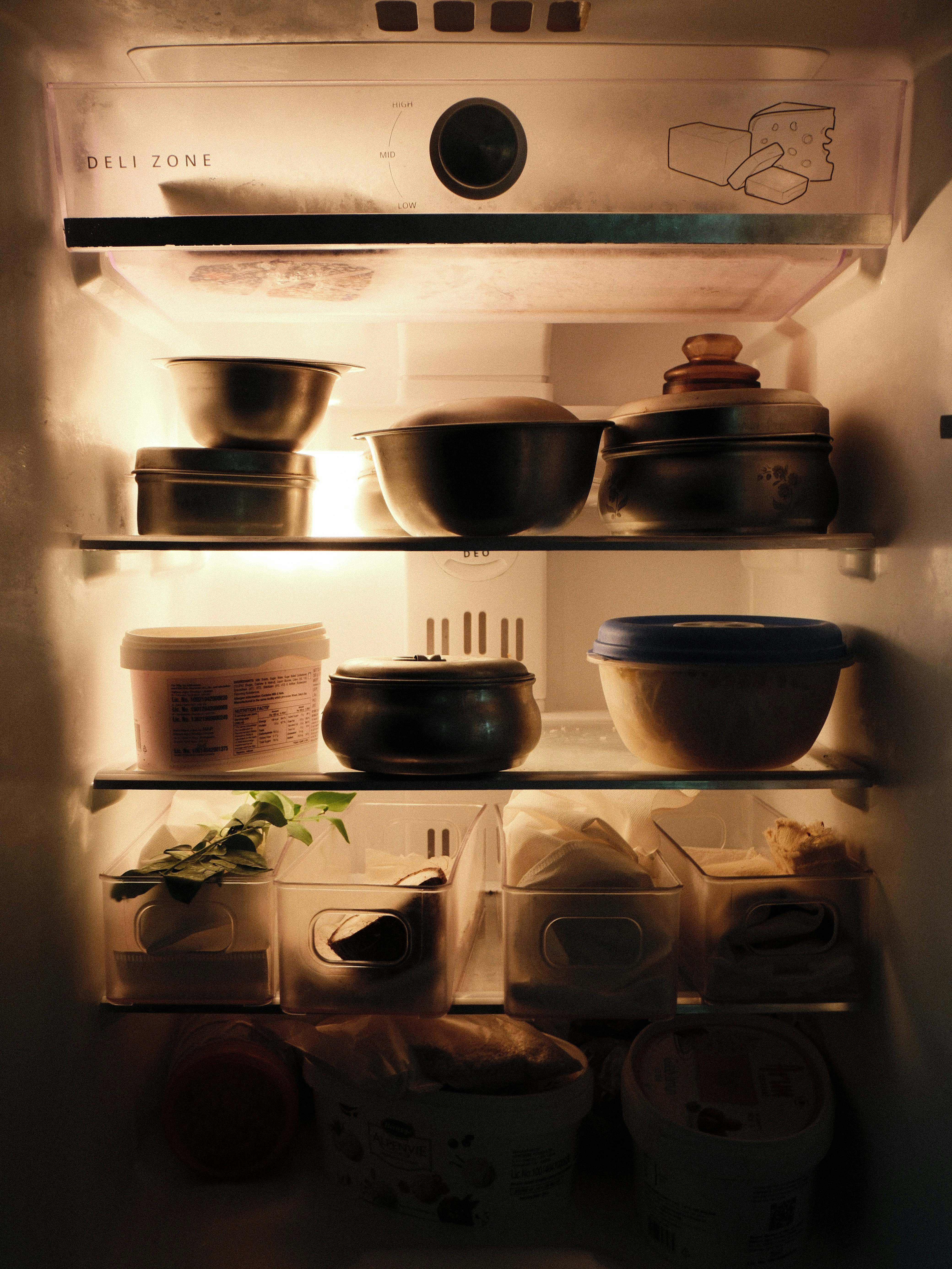 Refrigerator shelves with food containers - Free Photo on Unsplash
