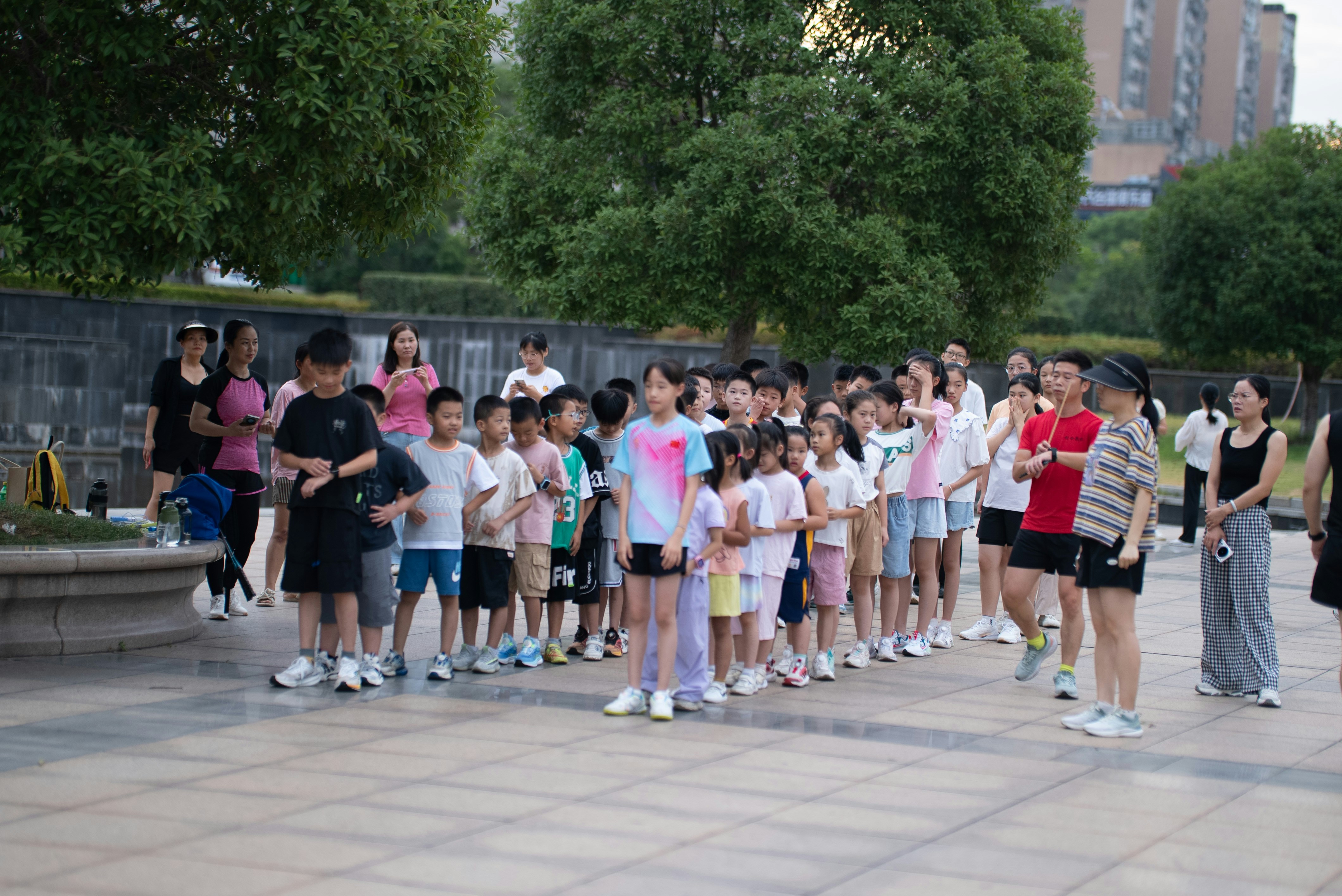 Group of children in paved plaza - Free Photo on Unsplash