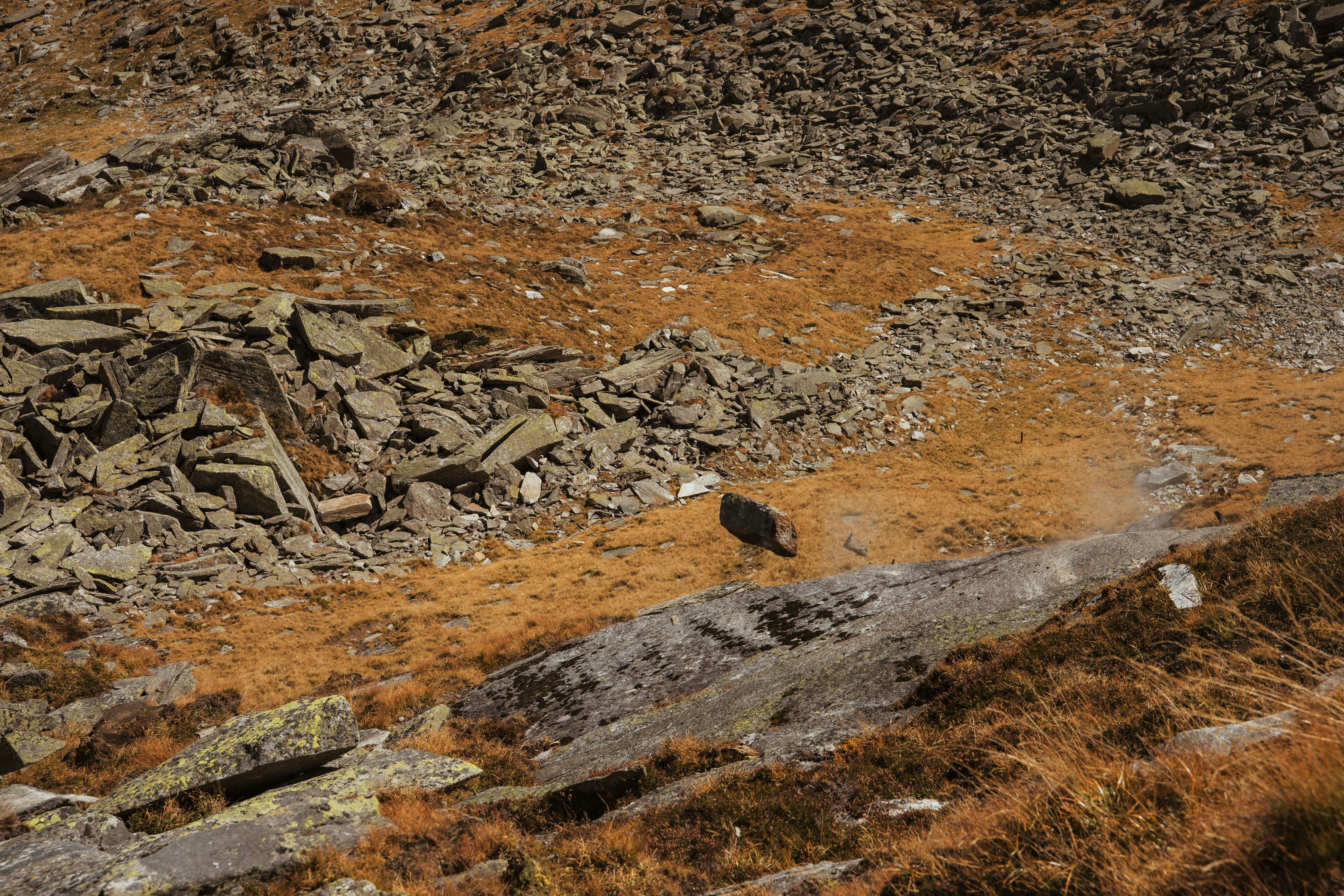 Rock tumbling down mountain slope - Free Photo on Unsplash