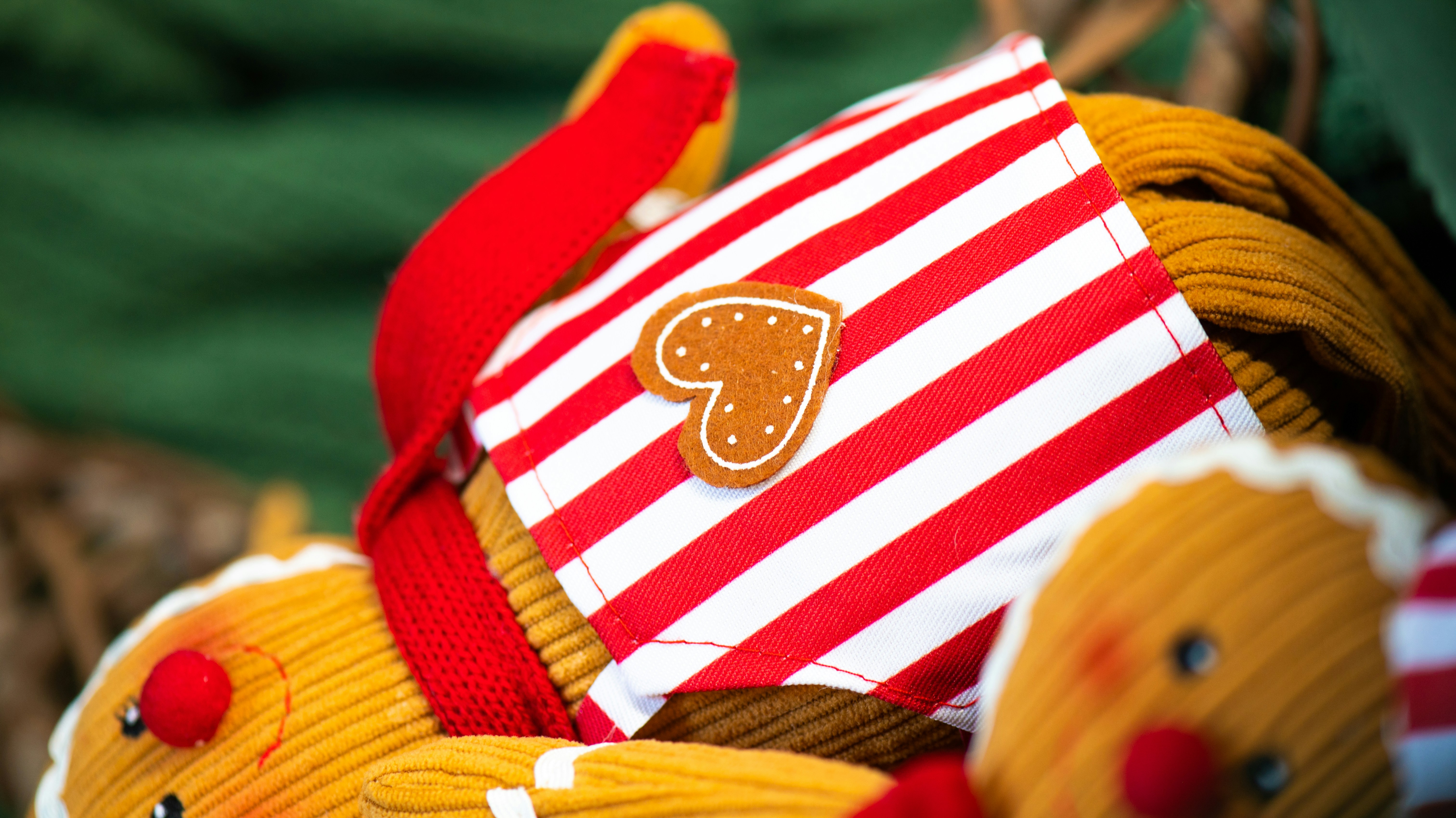 Gingerbread man plush with striped apron - Free Photo on Unsplash