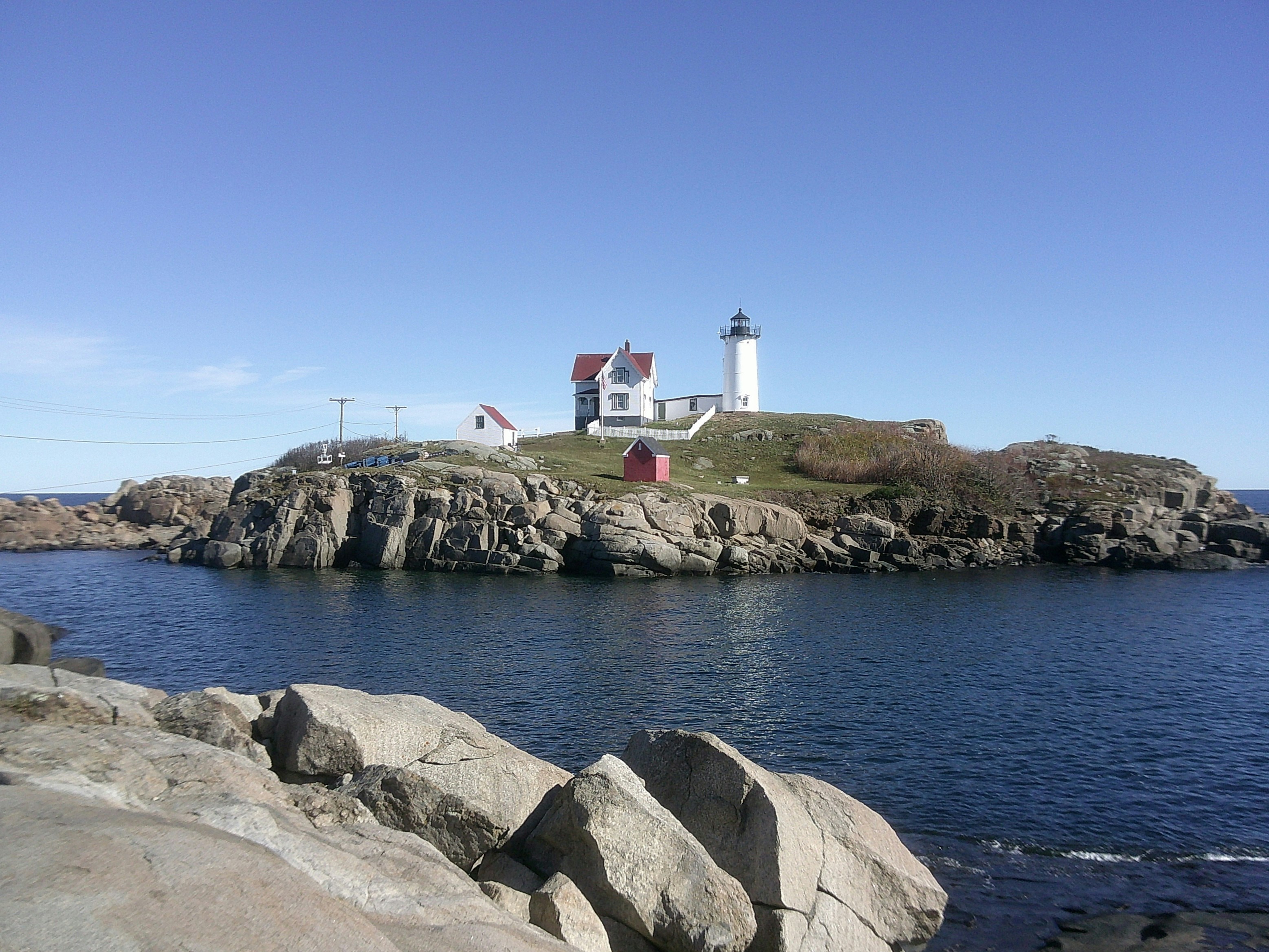 Nubble Lighthouse on rocky island - Free Photo on Unsplash