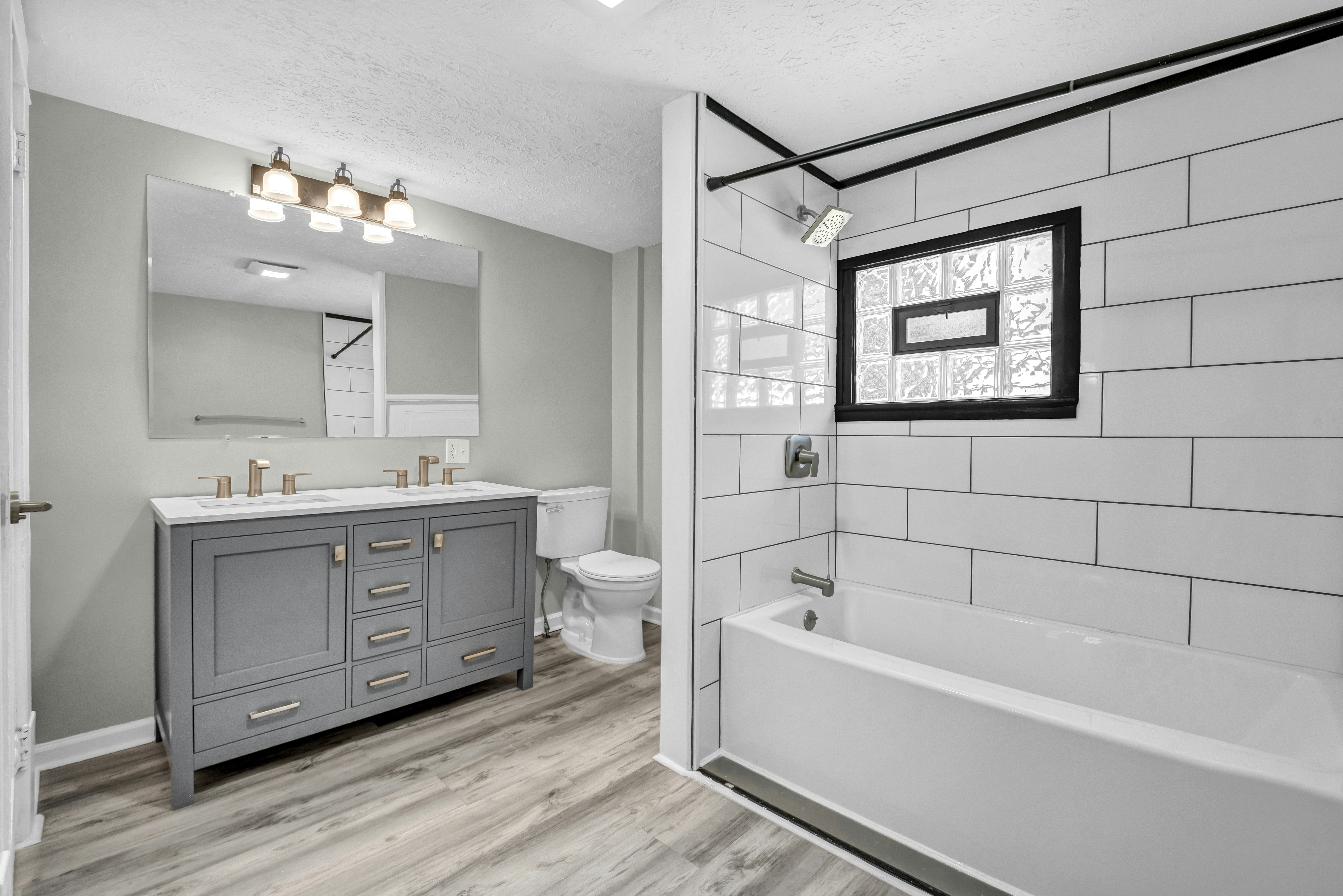 Modern bathroom with grey vanity - Free Photo on Unsplash