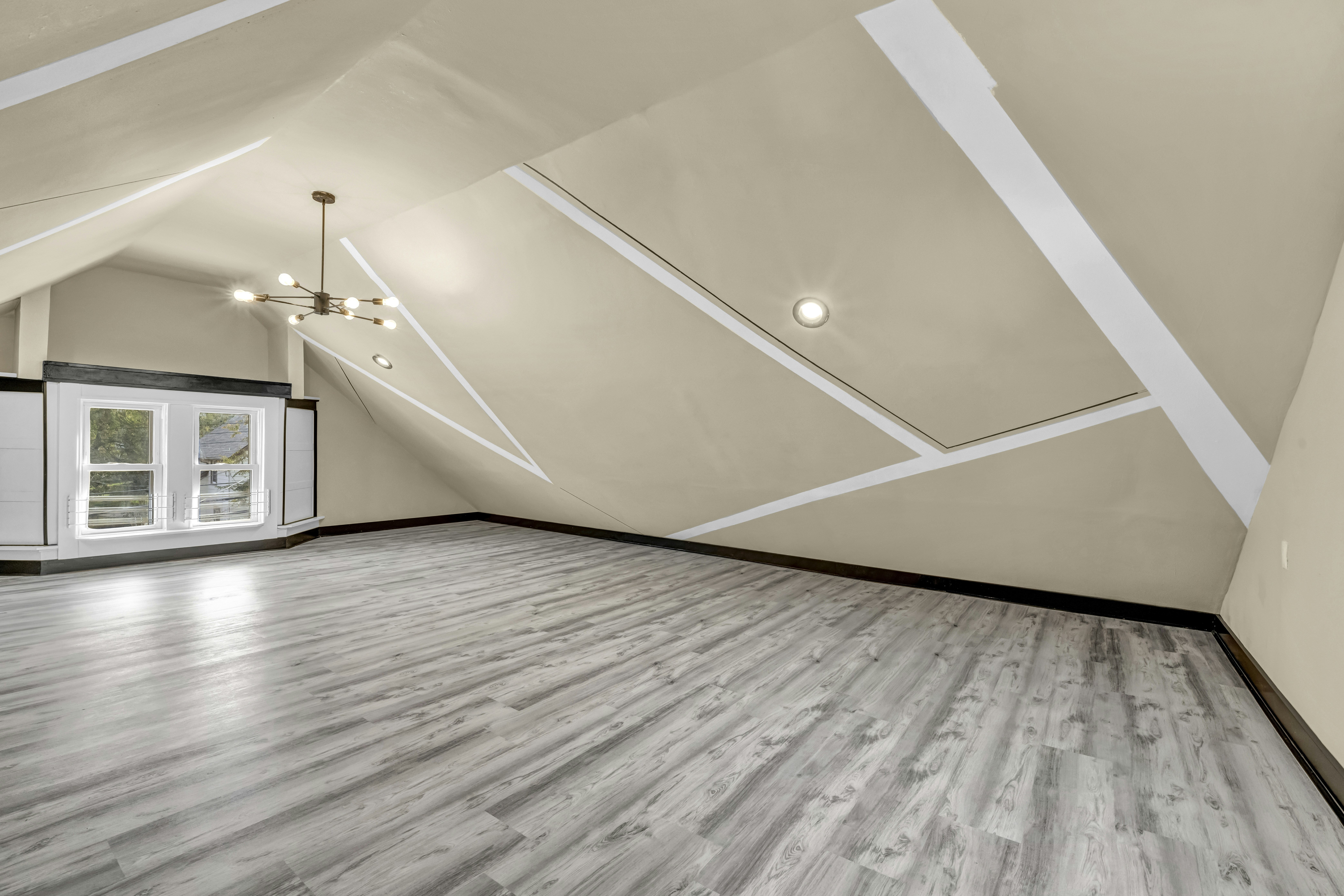 Empty attic room with modern chandelier - Free Photo on Unsplash