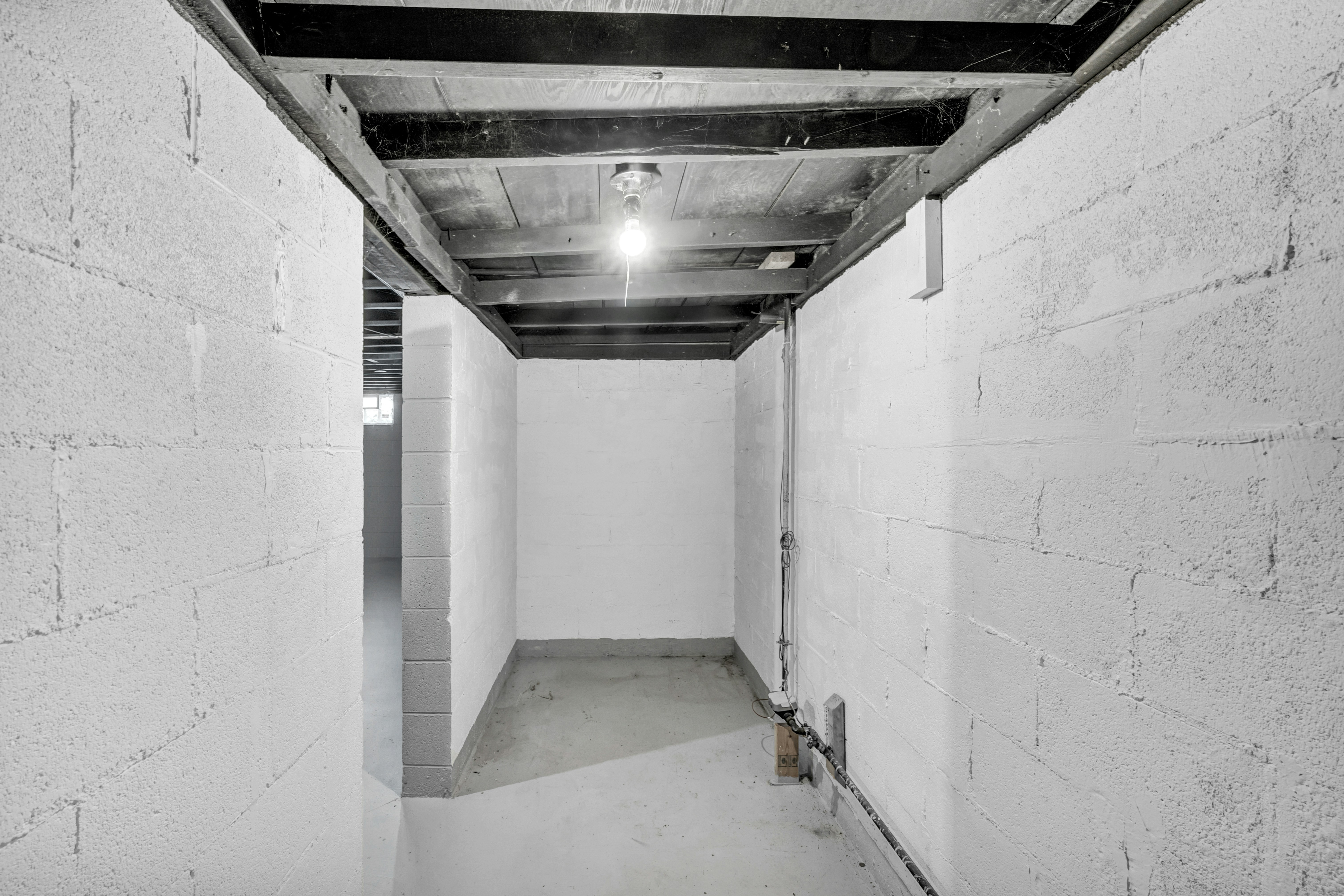 Basement corridor with white block walls - Free Photo on Unsplash