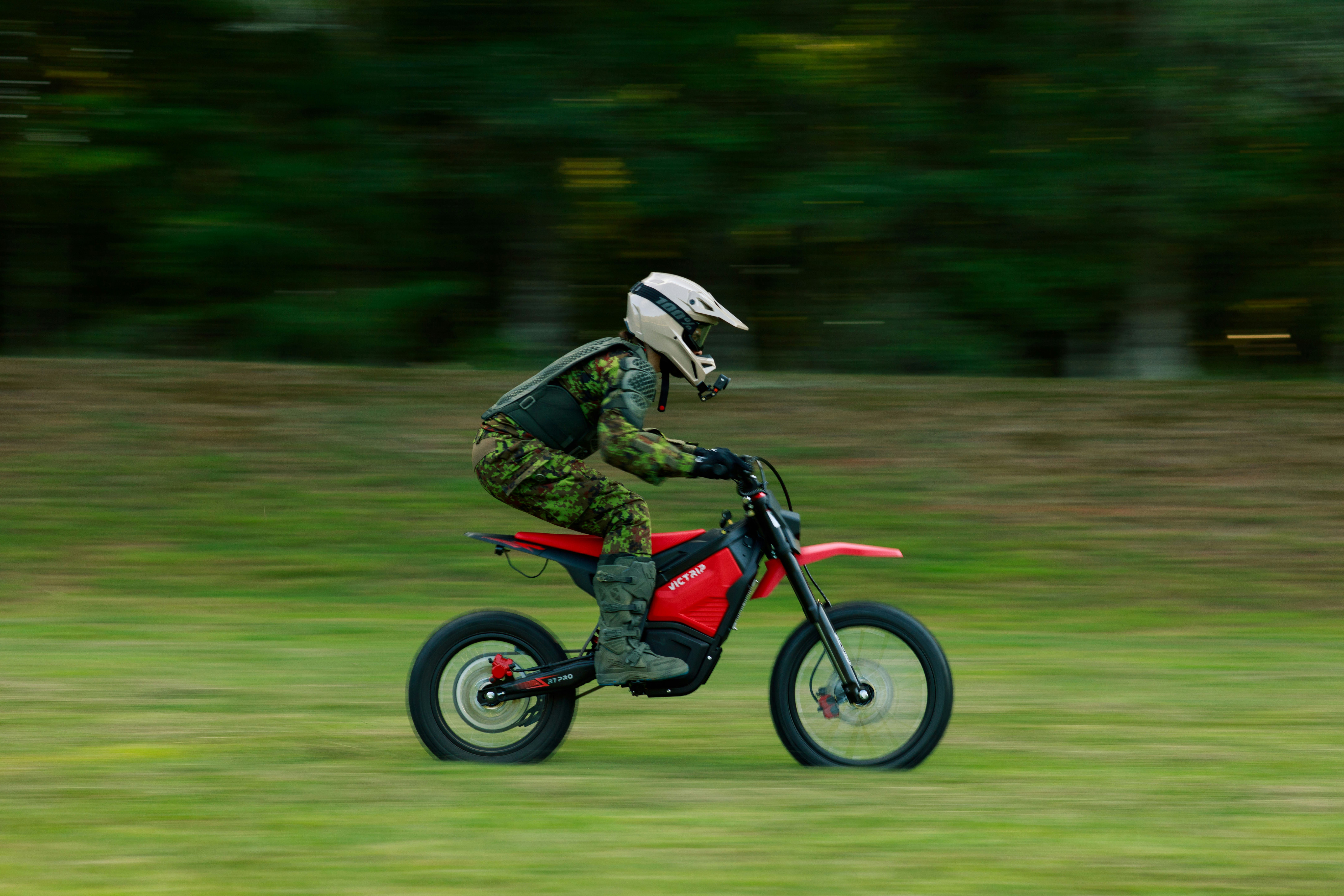 Person riding red electric dirt bike - Free Photo on Unsplash