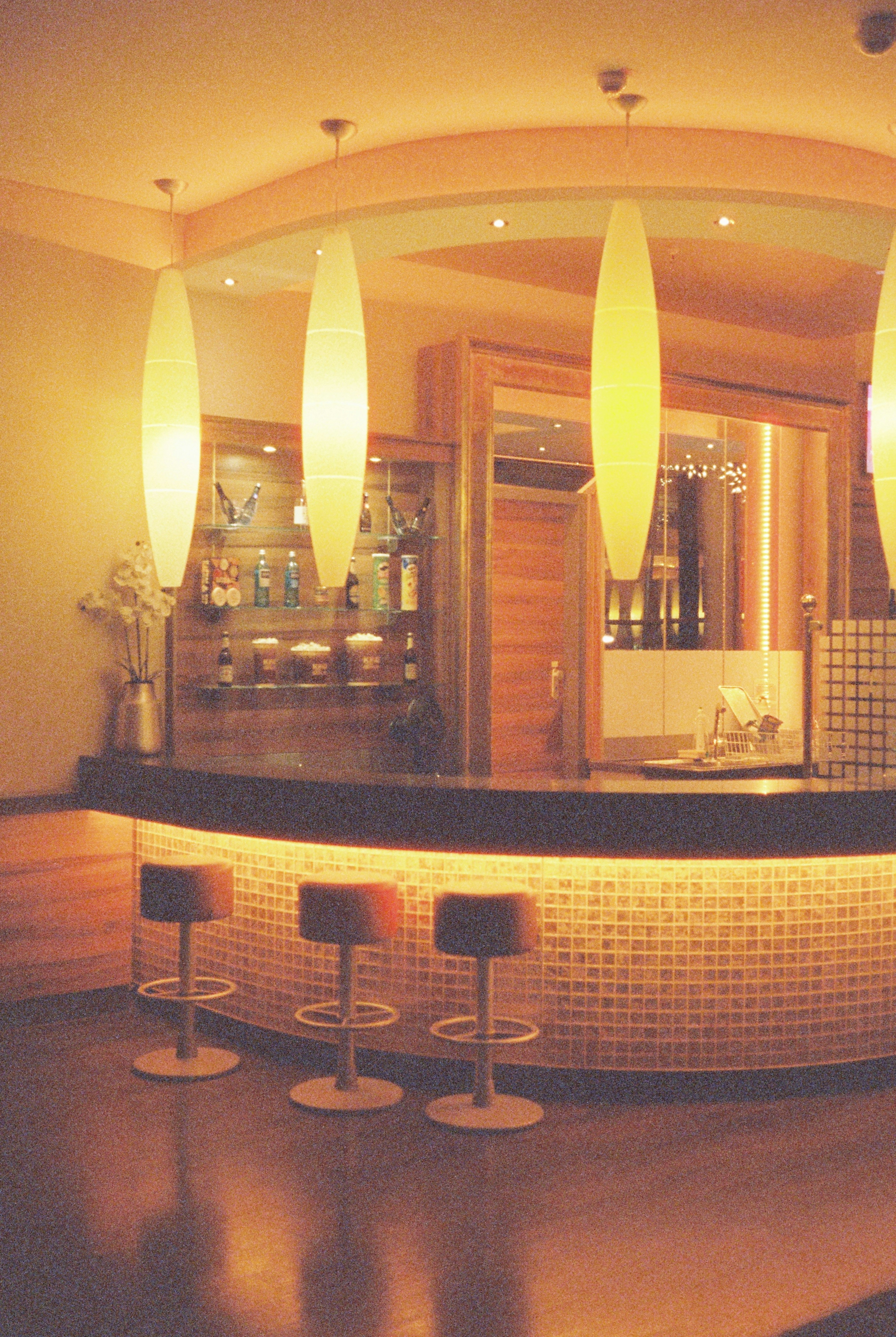 Curved bar with stools and lighting - Free Photo on Unsplash