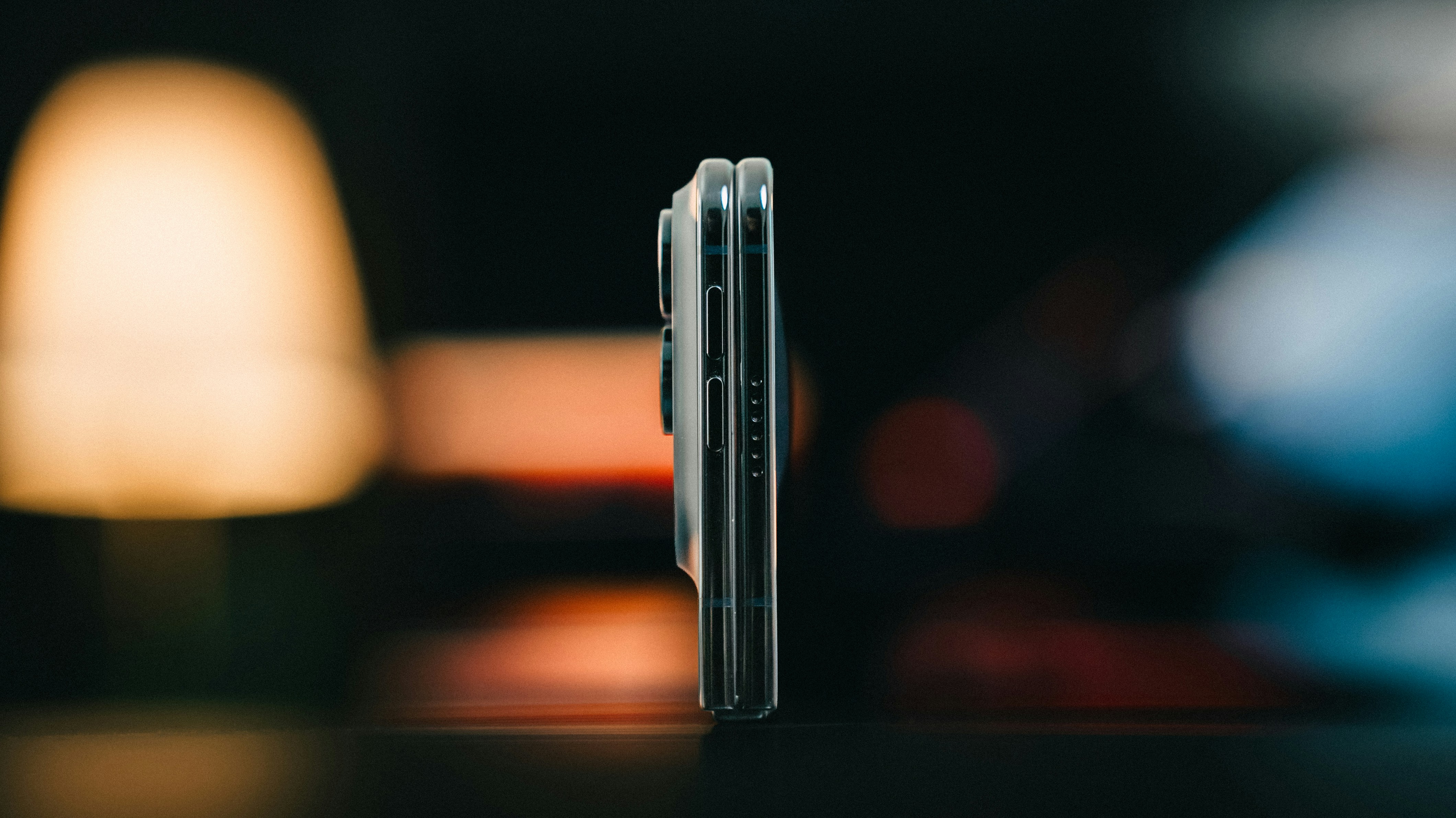 Folded smartphone profile on dark surface - Free Photo on Unsplash