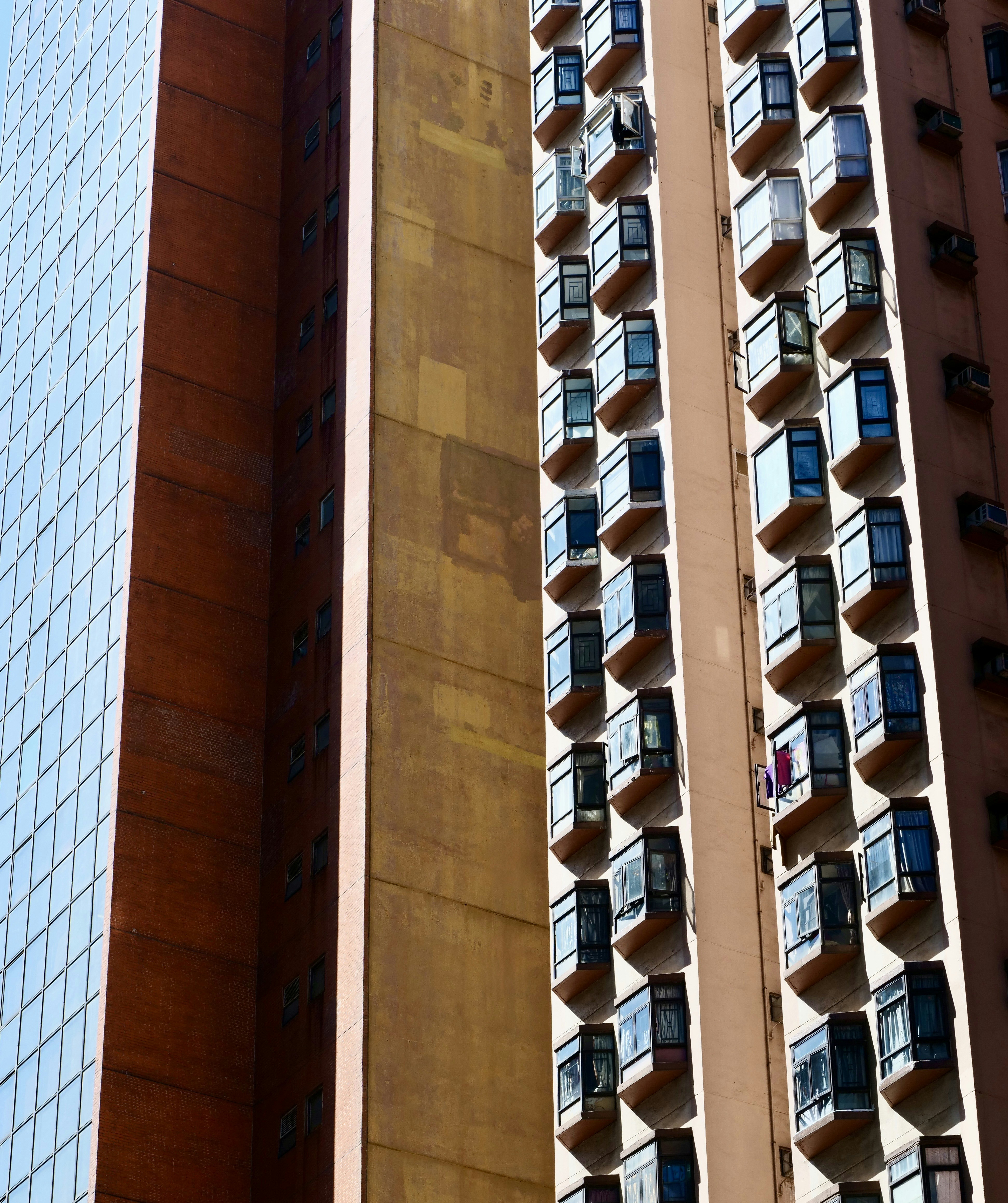 Apartment building with bay windows - Free Photo on Unsplash