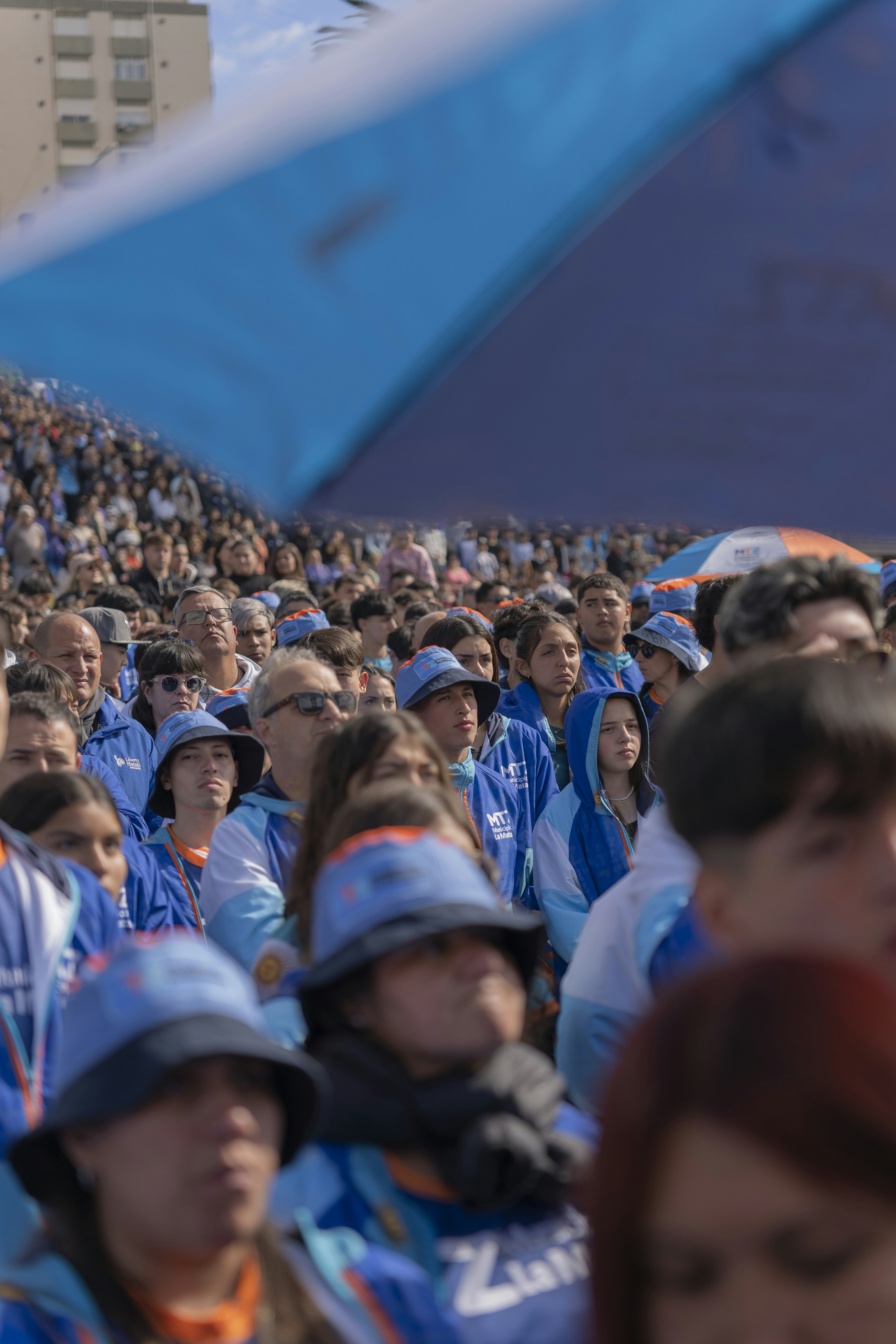 Crowd wearing blue and white hats - Free Photo on Unsplash