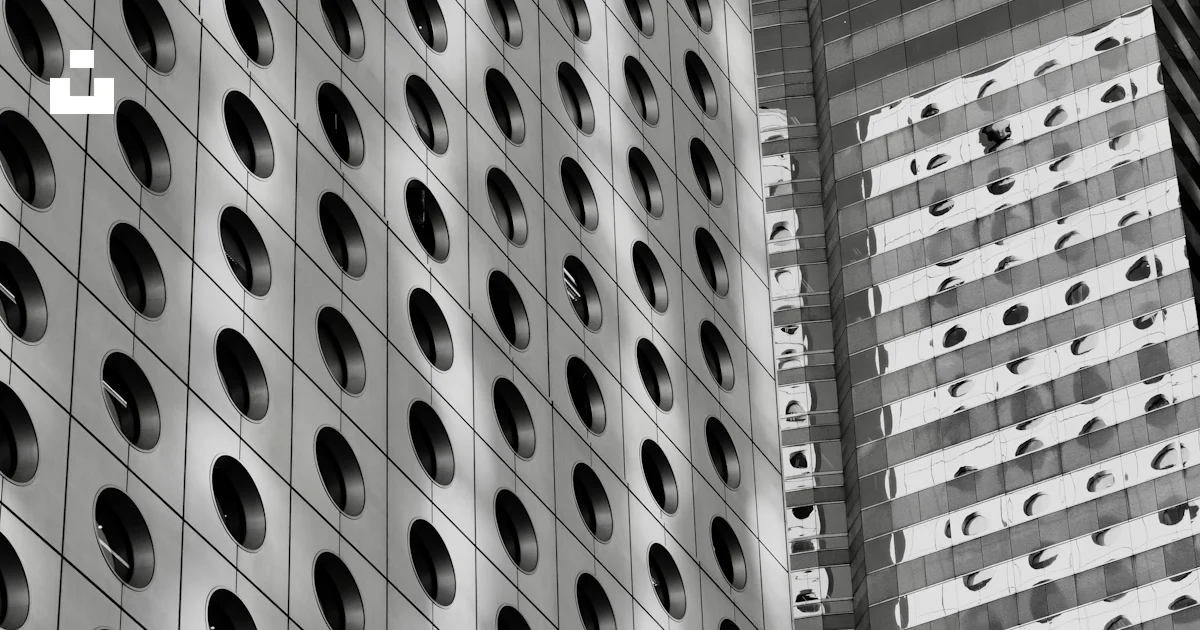 Normal Calendar Design Modern skyscraper facade with circular windows - Free Photo on Unsplash