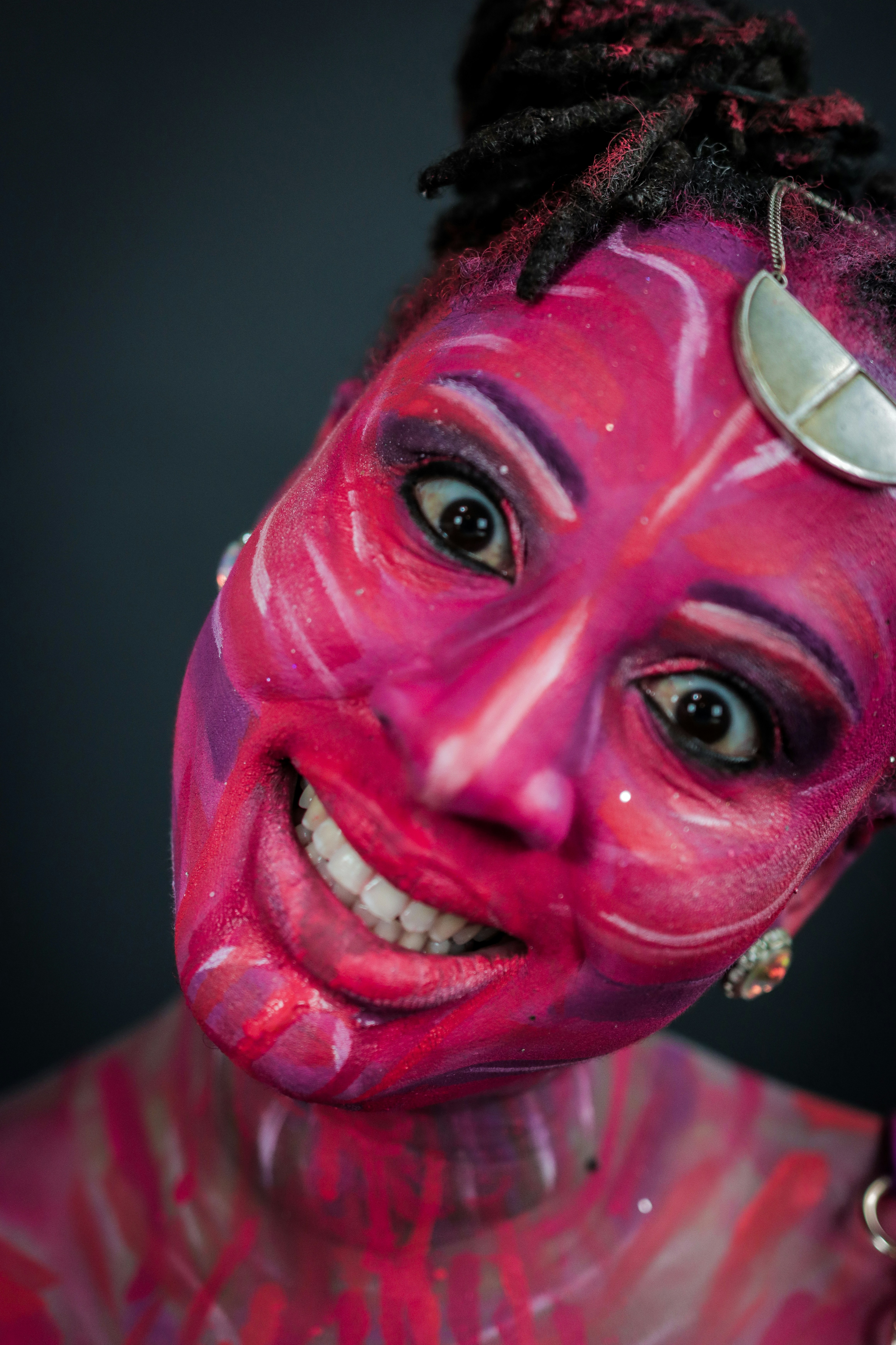 Person with pink face paint - Free Photo on Unsplash