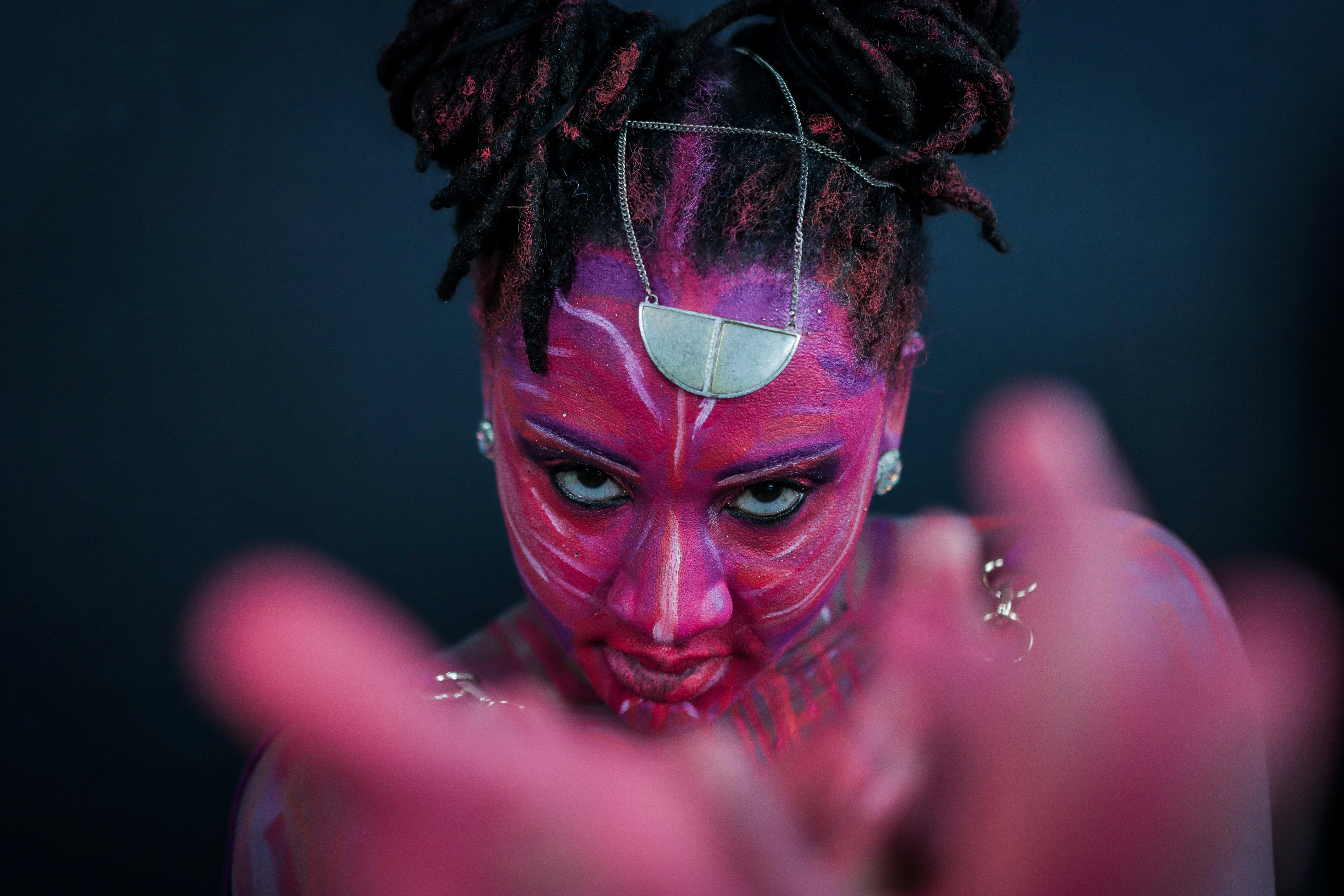 Person with pink face paint - Free Photo on Unsplash