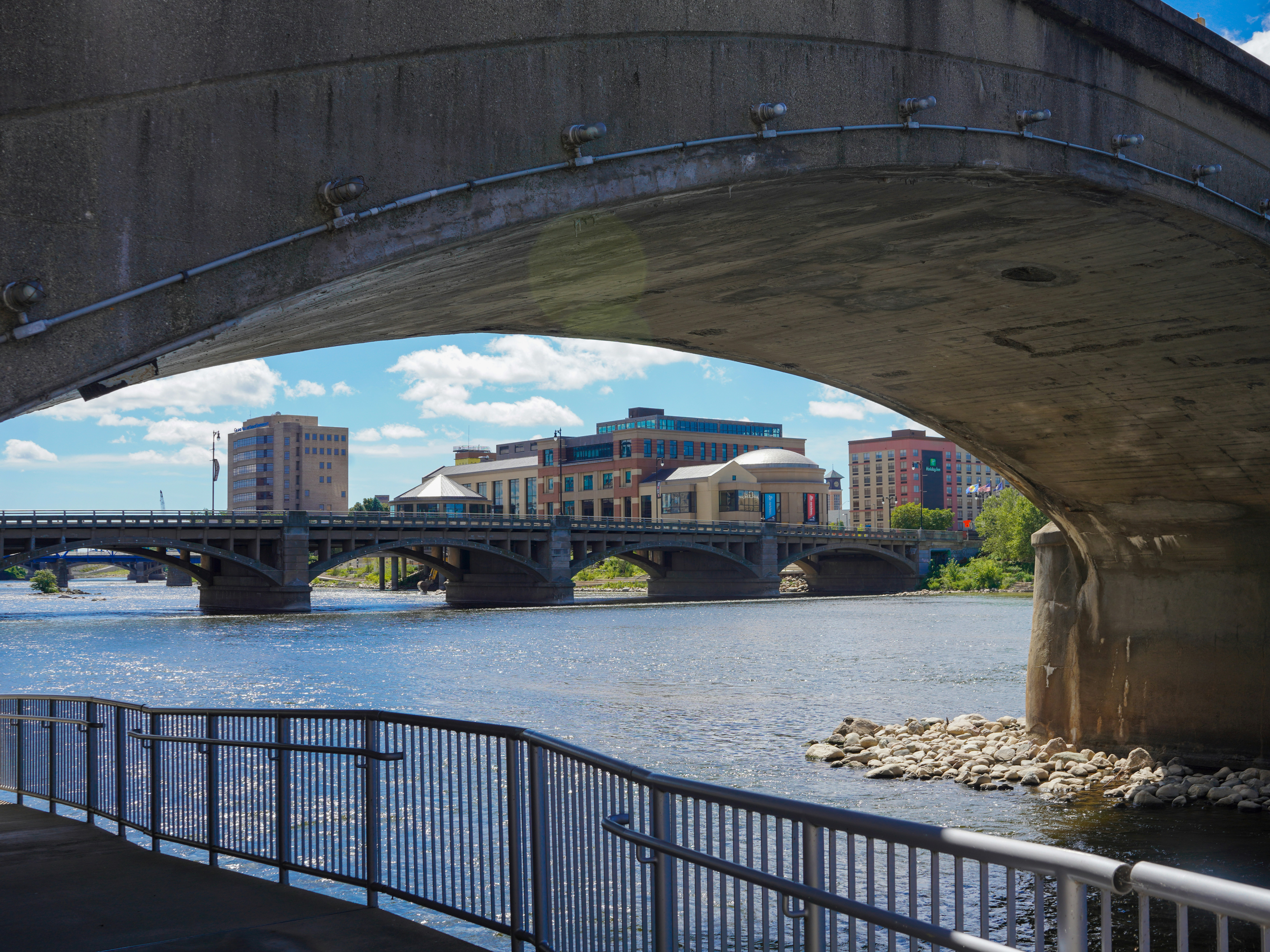 Concrete bridge arch over river - Free Photo on Unsplash
