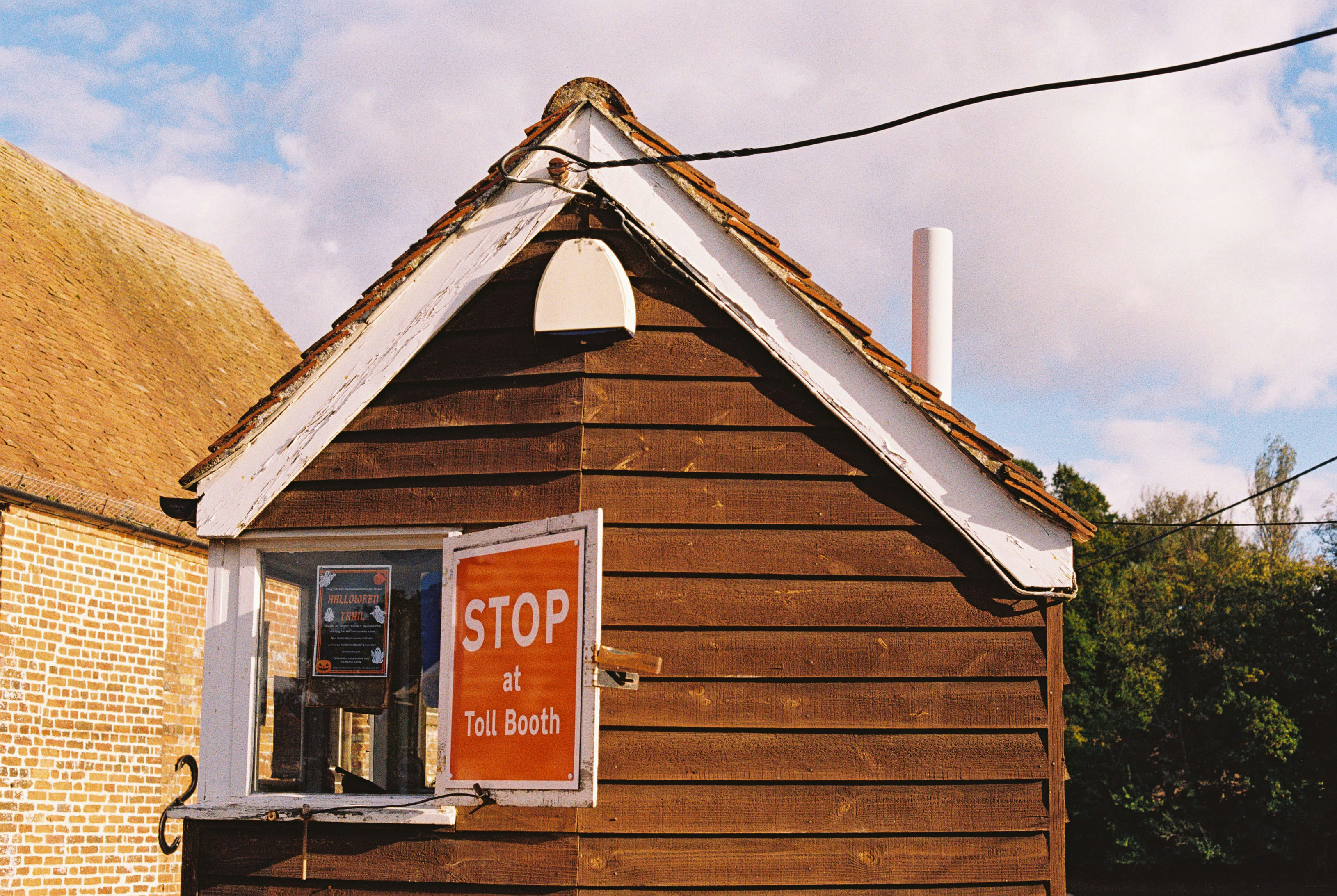 Wooden toll booth with stop sign - Free Photo on Unsplash