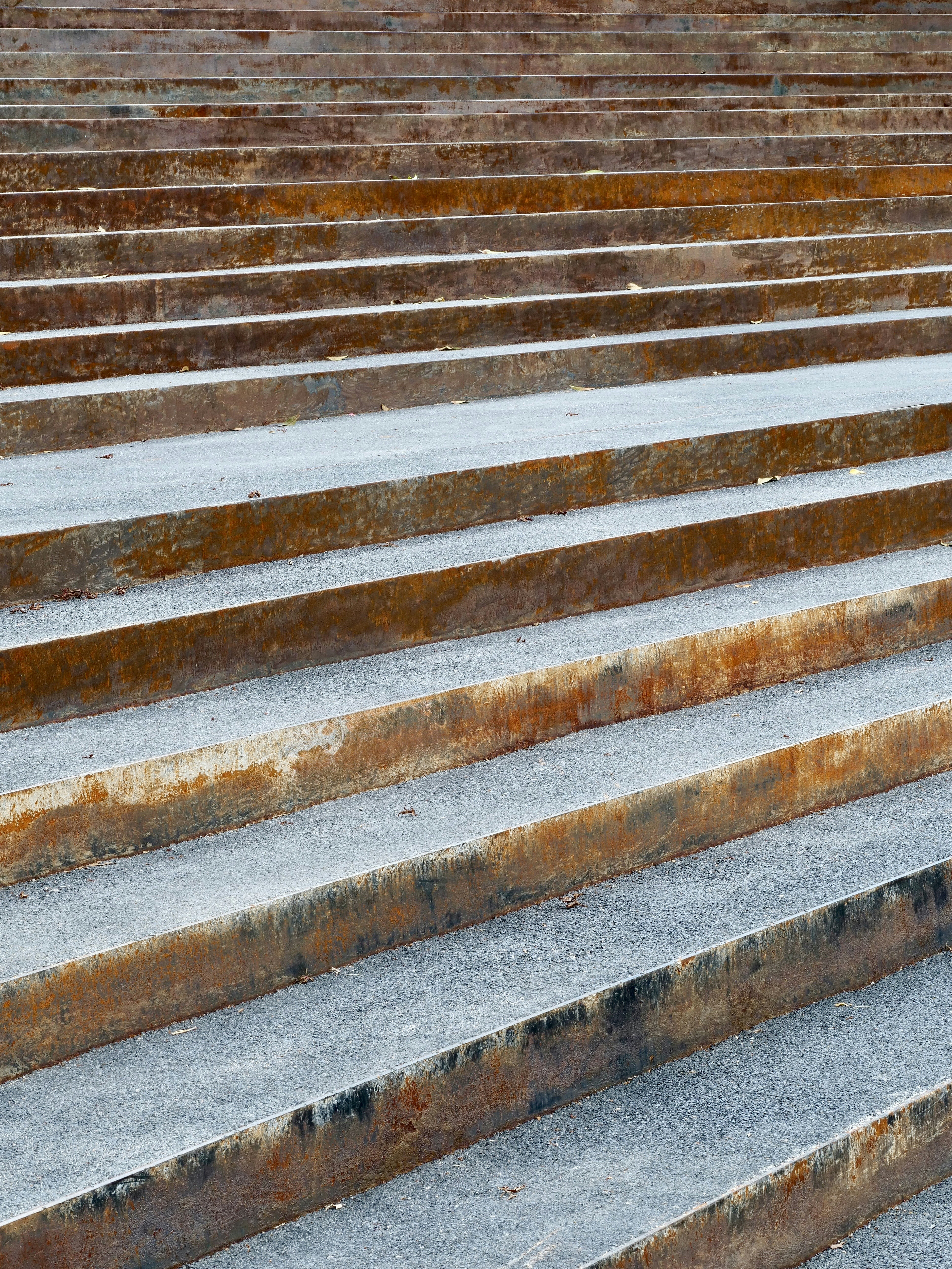 Concrete stairs with rusty metal risers - Free Photo on Unsplash