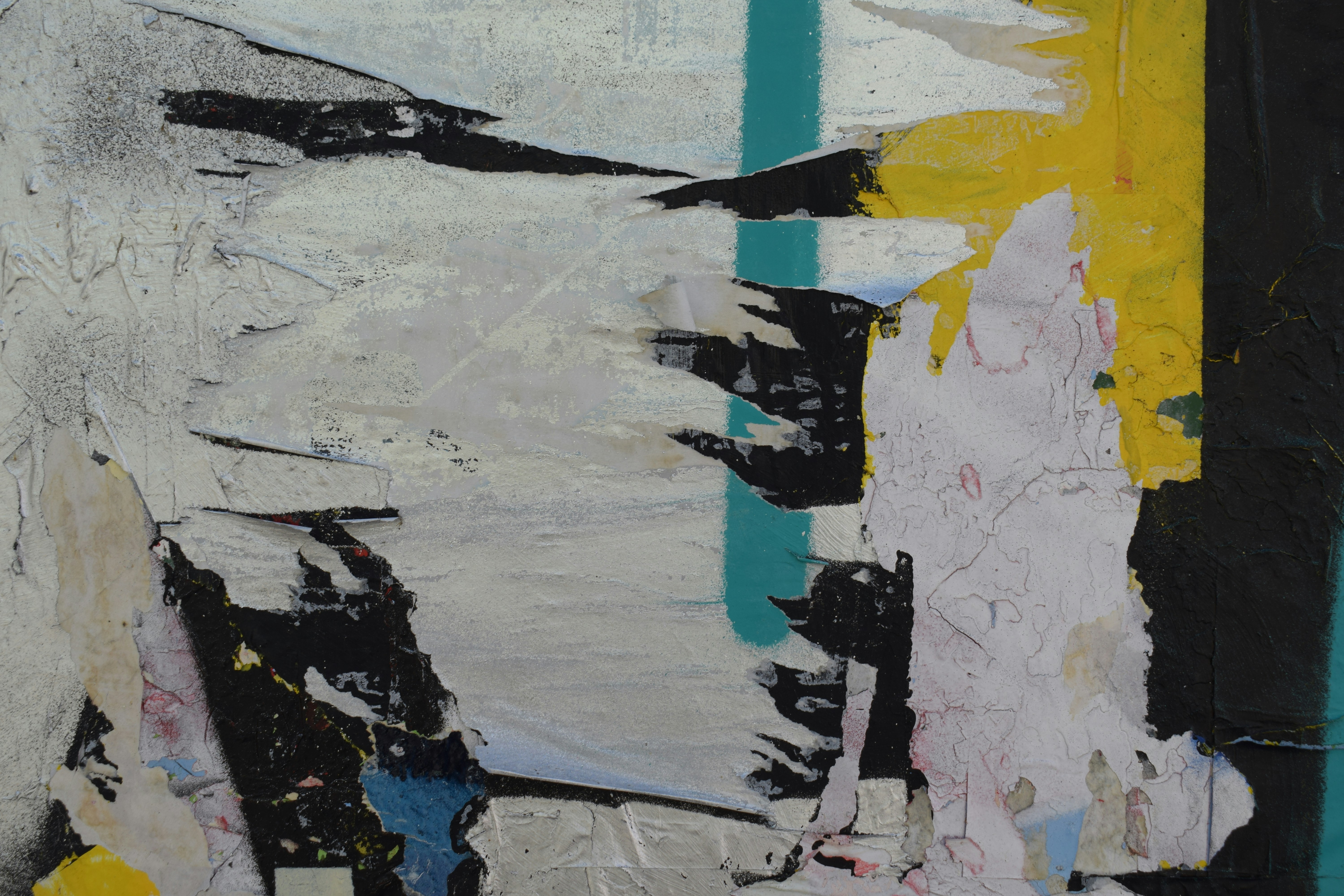 Torn paper layers on teal wall - Free Photo on Unsplash
