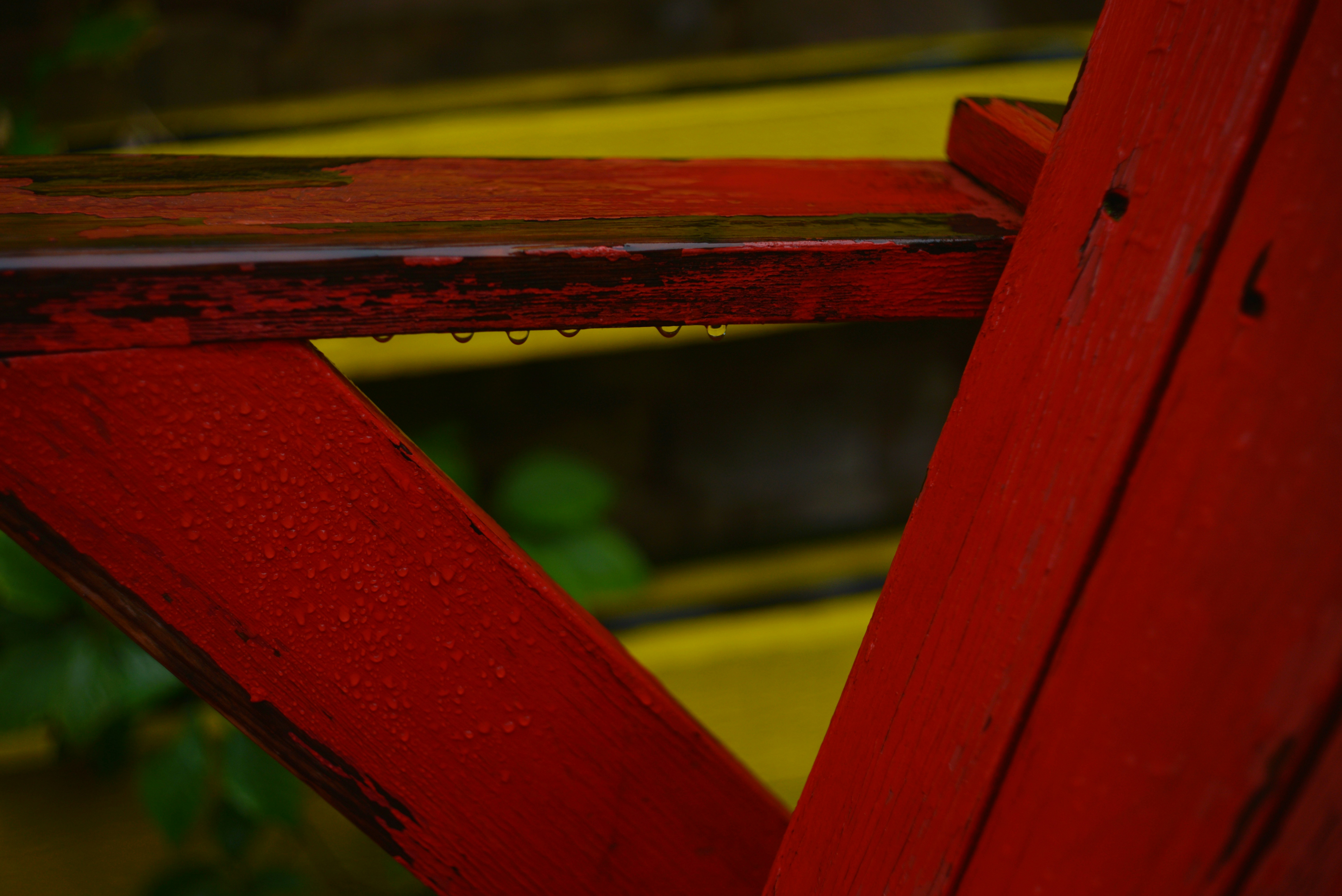 Raindrops on weathered red railing - Free Photo on Unsplash