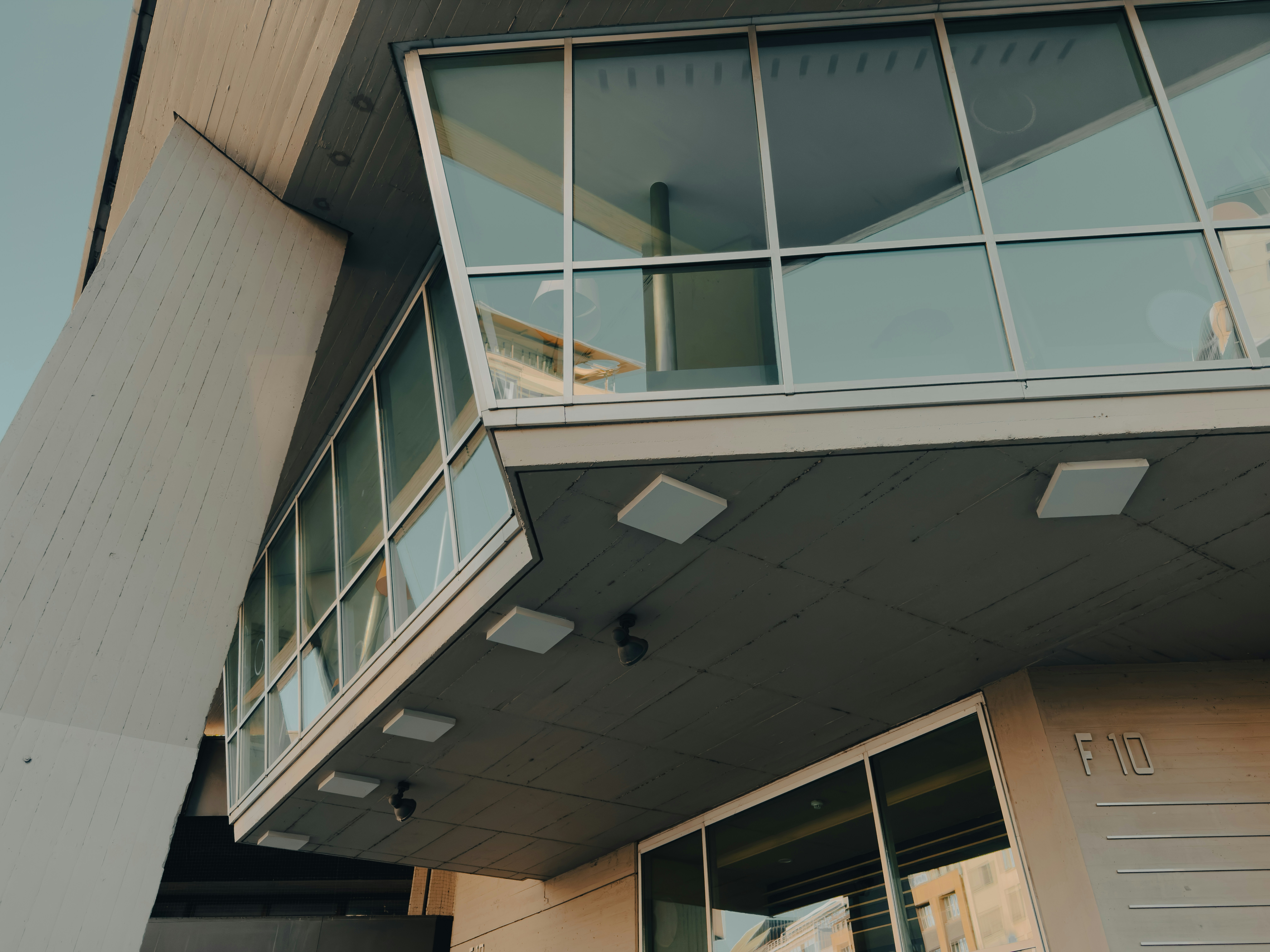 Modern concrete building with glass windows - Free Photo on Unsplash
