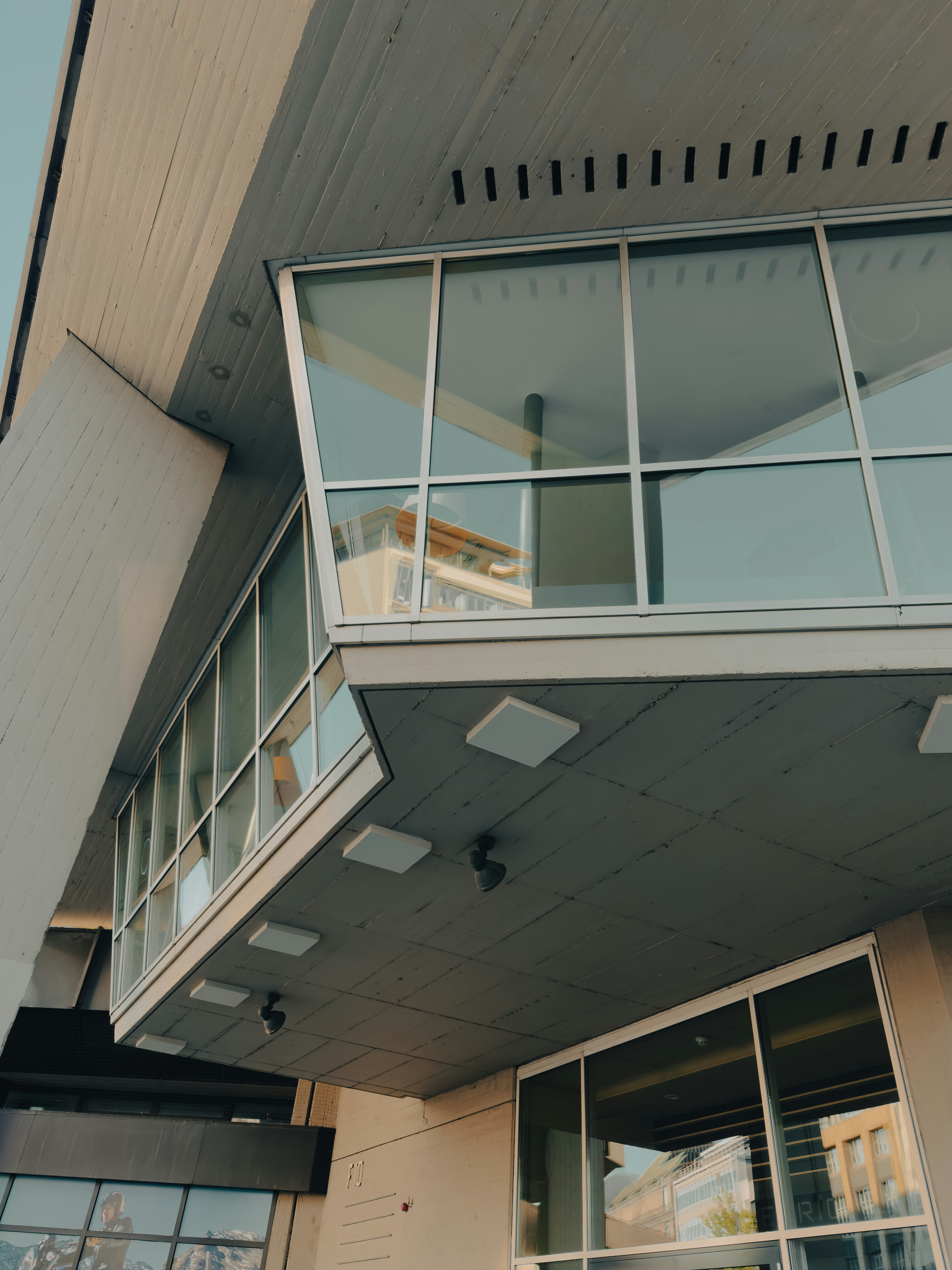 Modern concrete building with glass windows - Free Photo on Unsplash