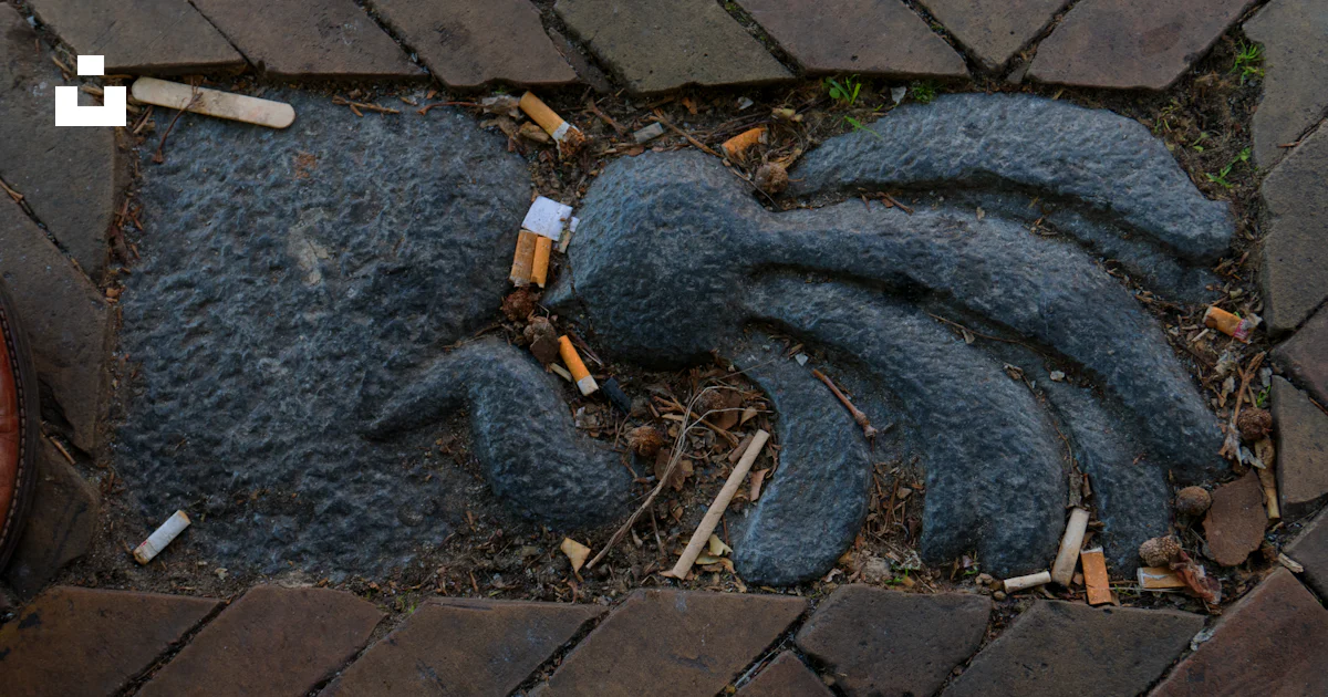 Menu Pavement Sign Stone octopus sculpture in brick pavement - Free Photo on Unsplash