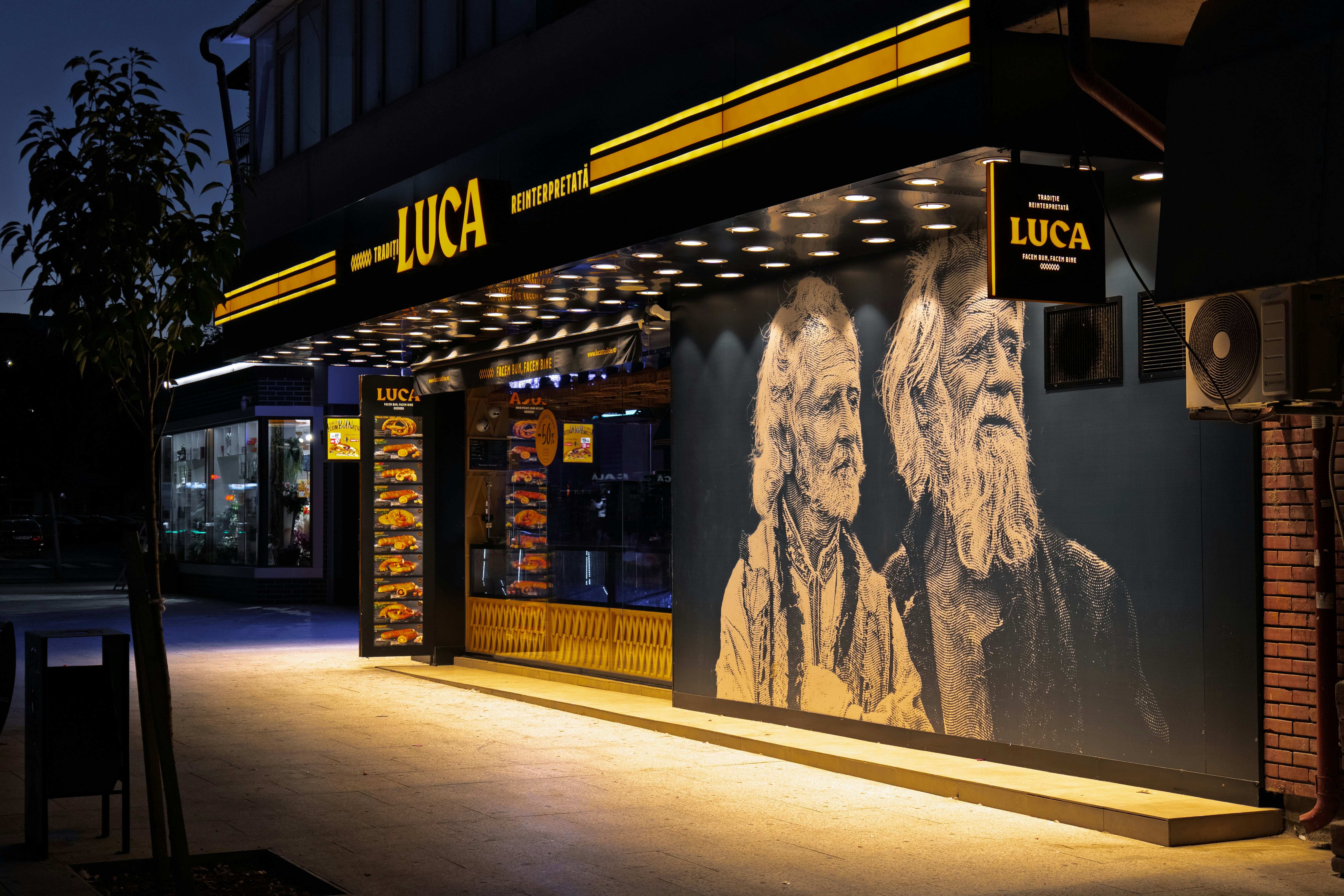 Luca bakery storefront with mural - Free Photo on Unsplash