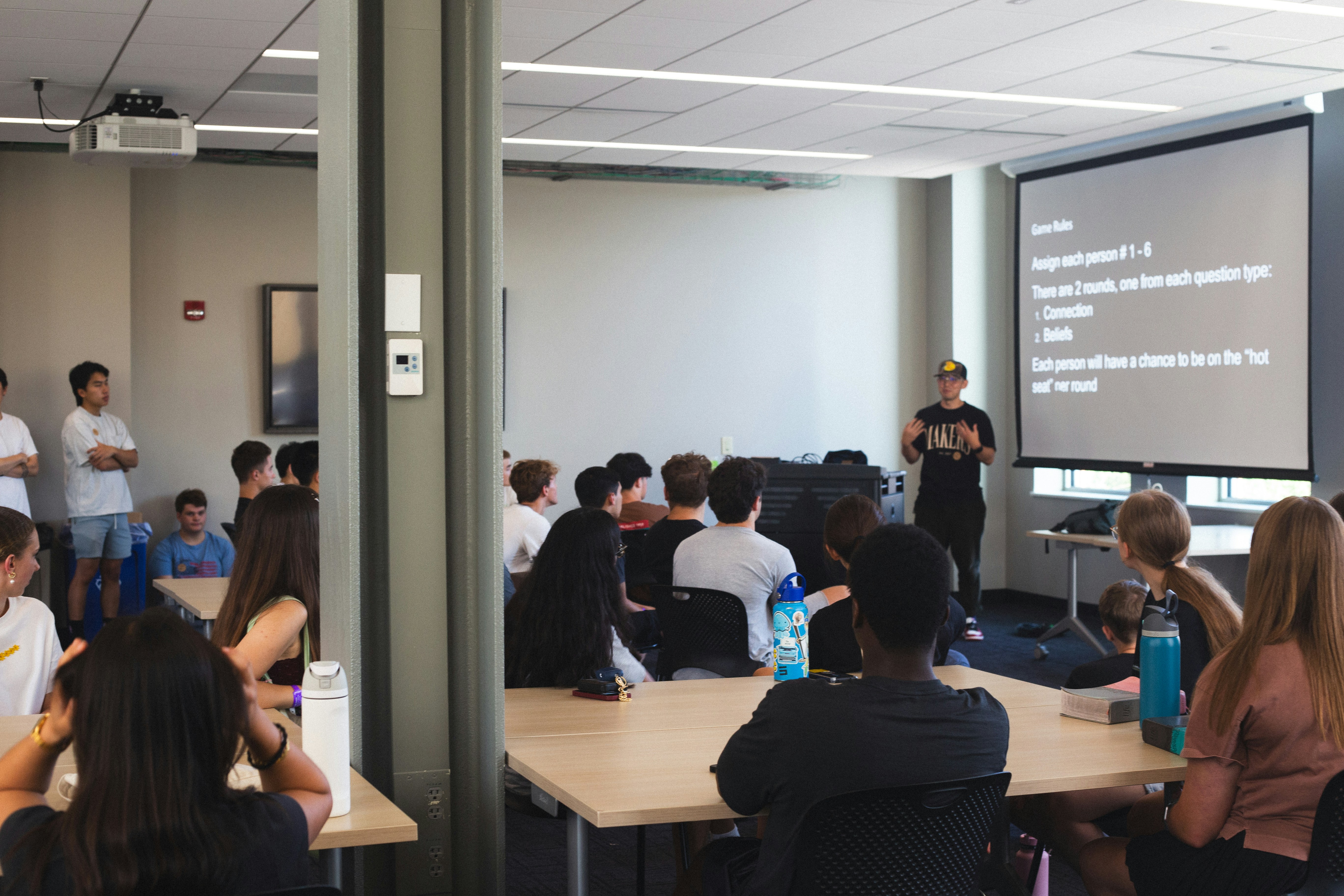 People listening to presenter in classroom - Free Photo on Unsplash