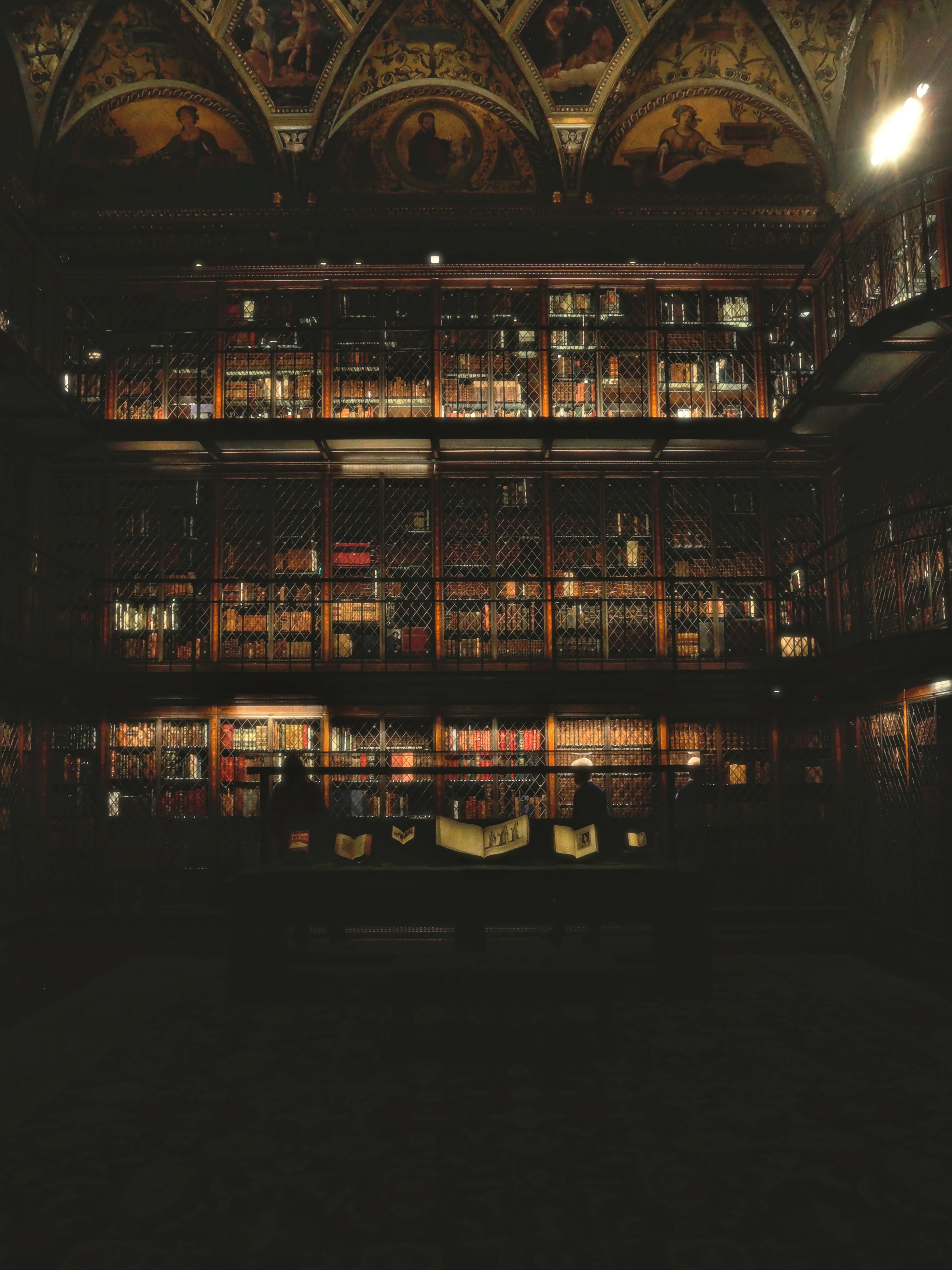 Historic multi-level wooden library interior - Free Photo on Unsplash