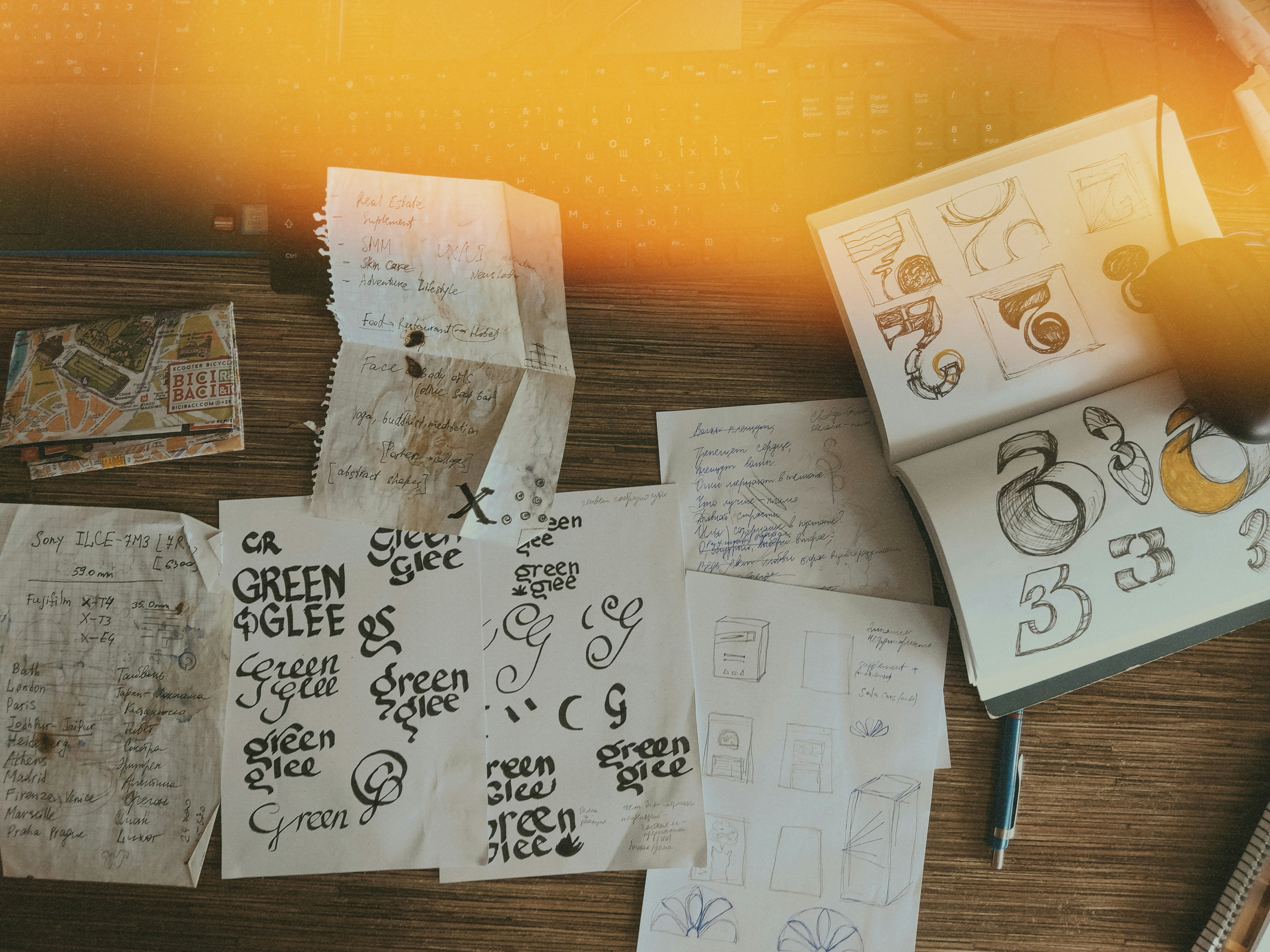 Handwritten sketches on wooden desk - Free Photo on Unsplash